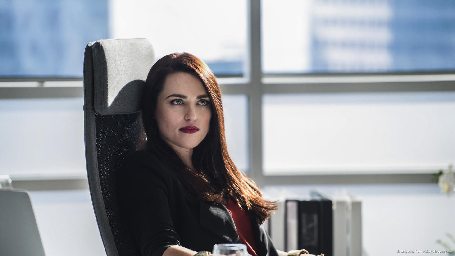 Katie McGrath sitting in an office chair HD Wallpaper