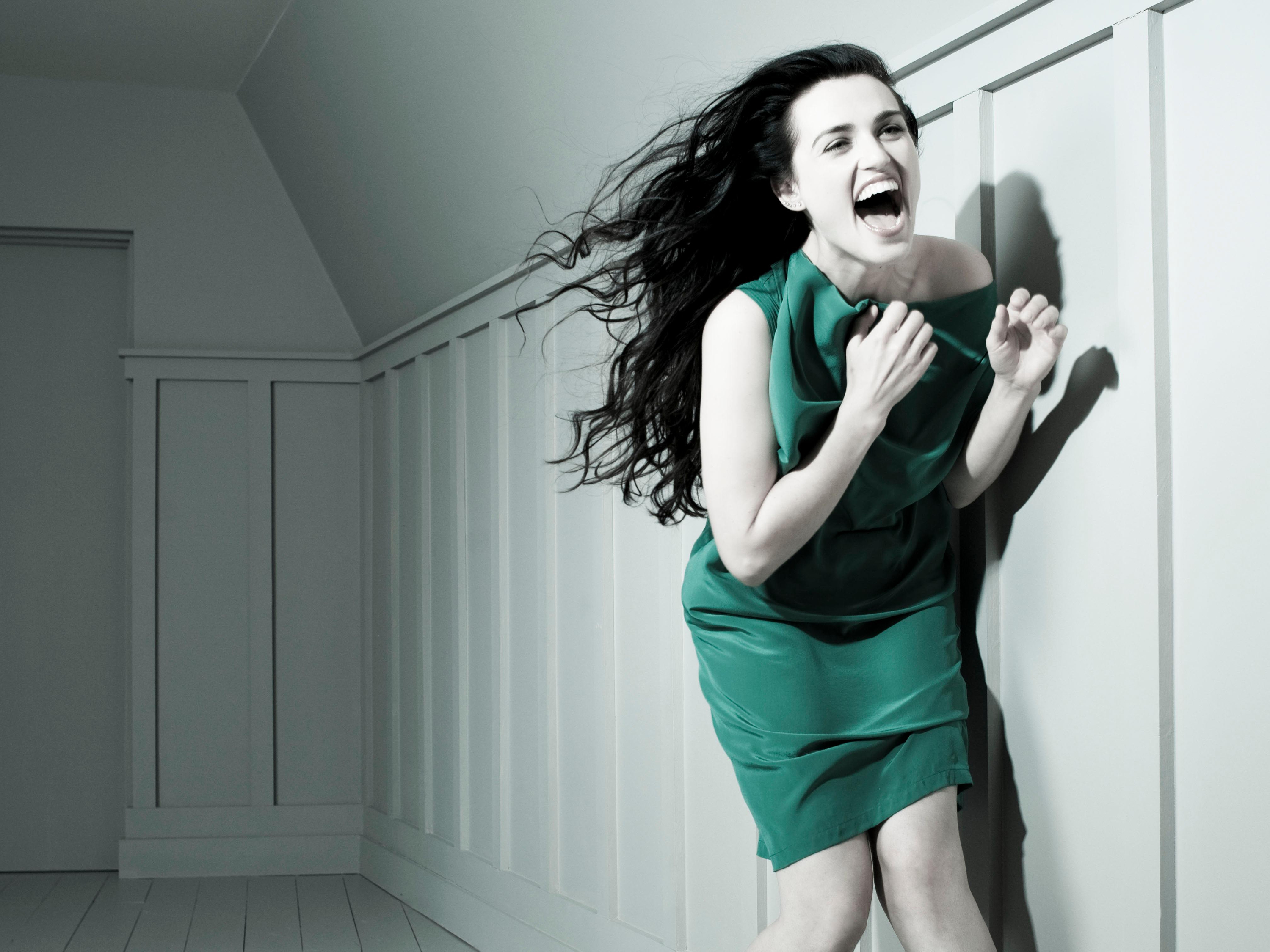 Katie McGrath screaming in a green dress HD Wallpaper
