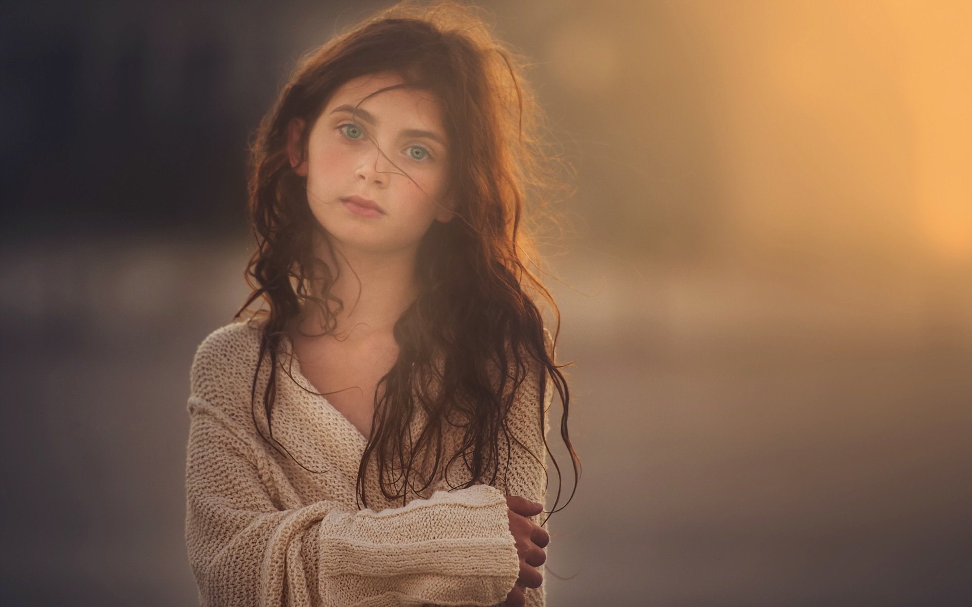 Young girl with long brown hair wearing a sweater HD Wallpaper