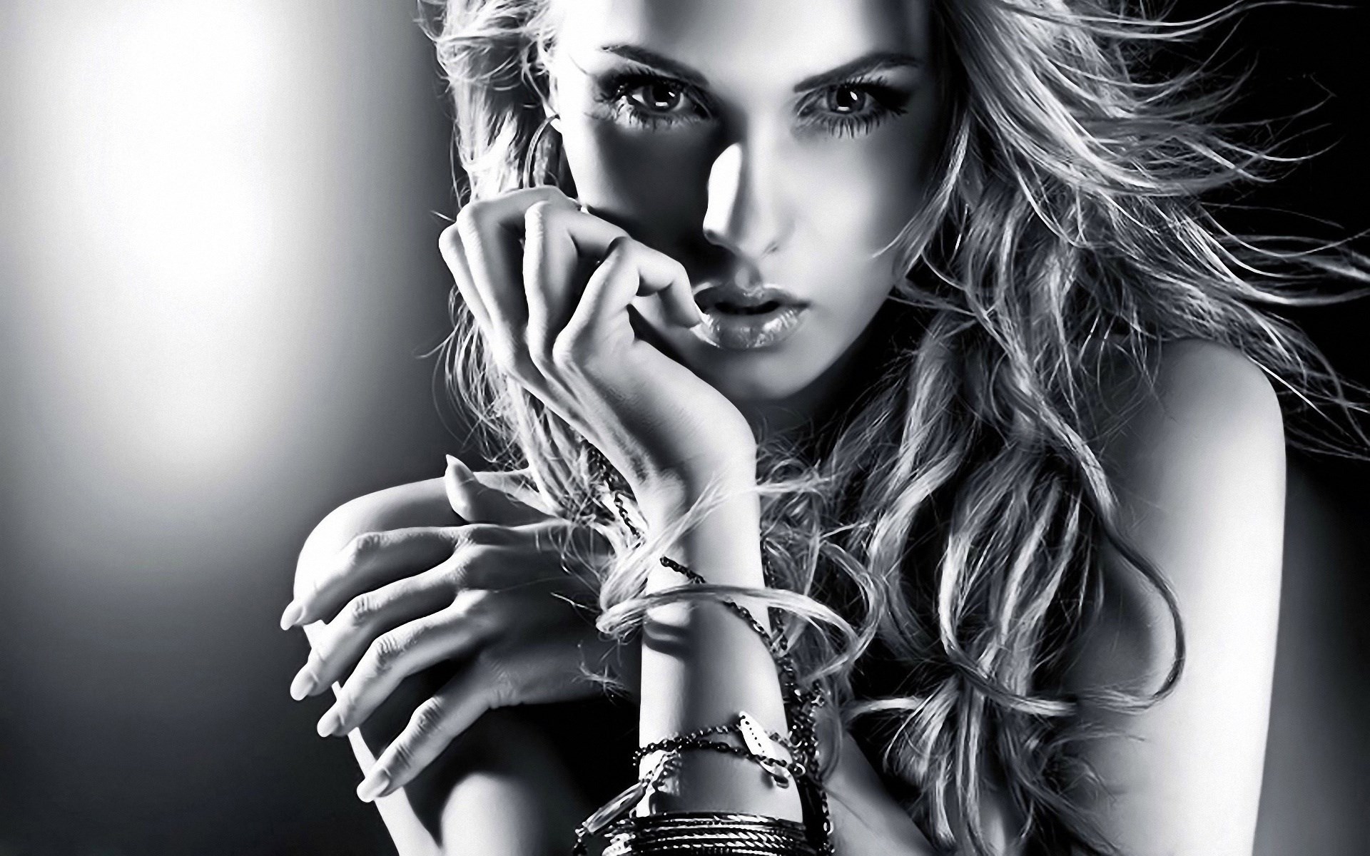 Woman with bracelets and flowing hair HD Wallpaper