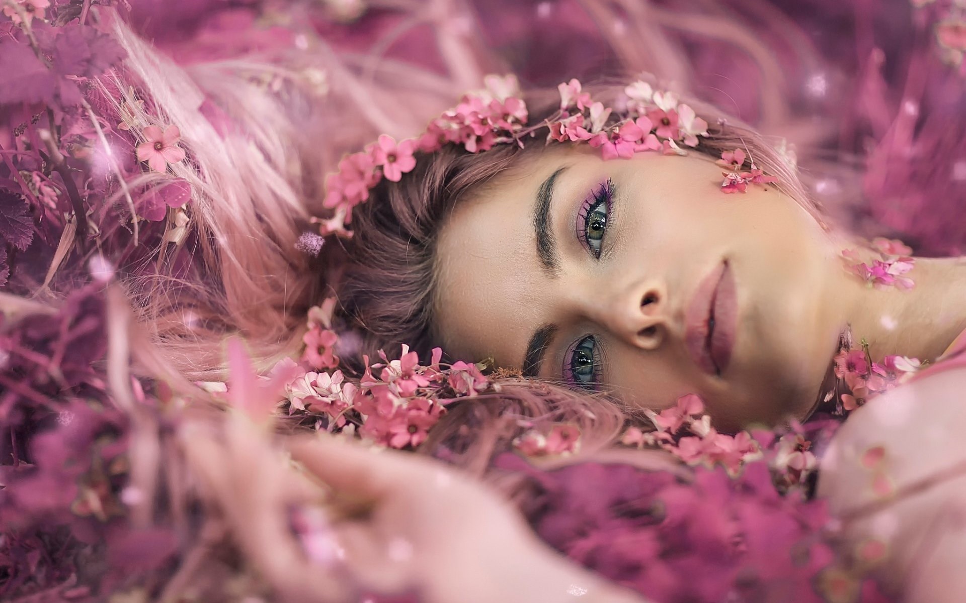 Woman with pink flowers and pink hair HD Wallpaper