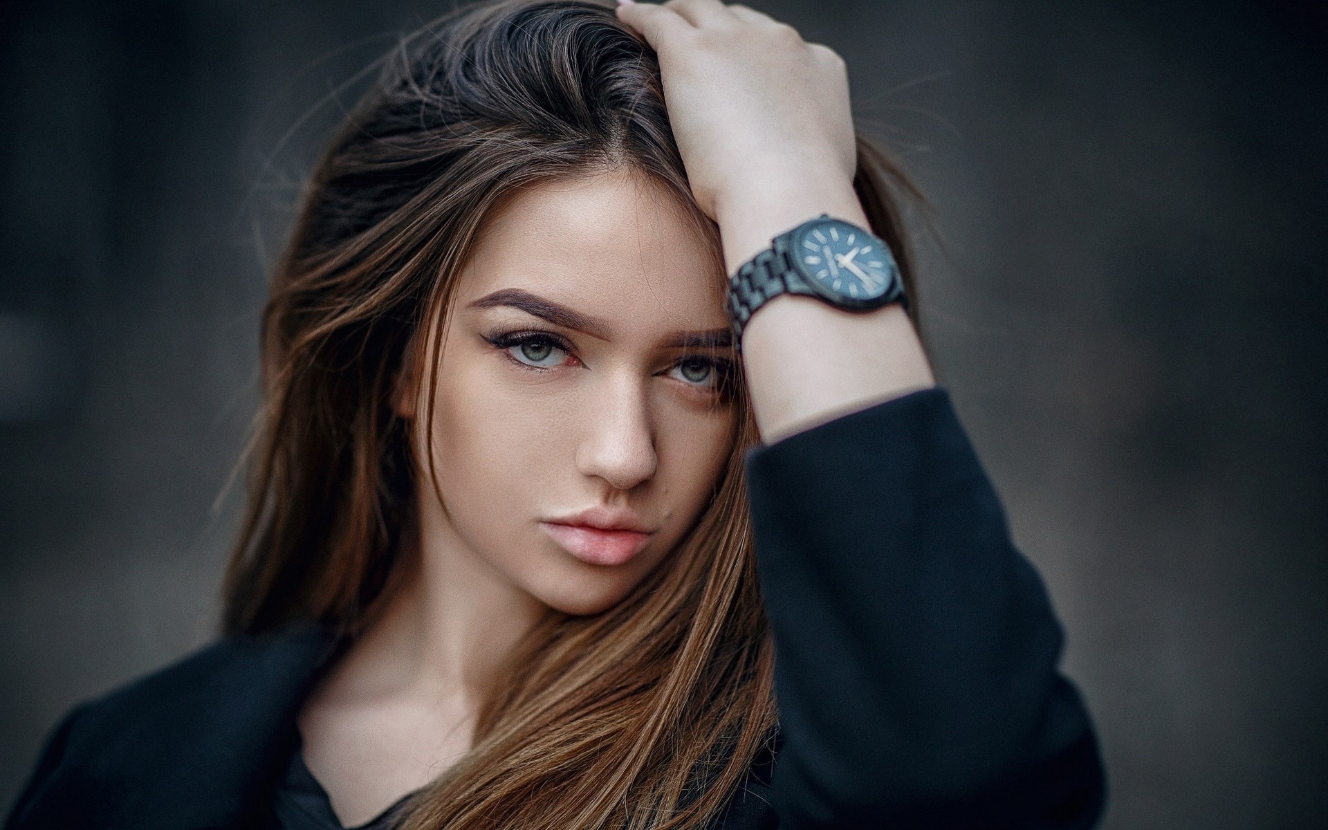 Woman with hand on head wearing a watch HD Wallpaper