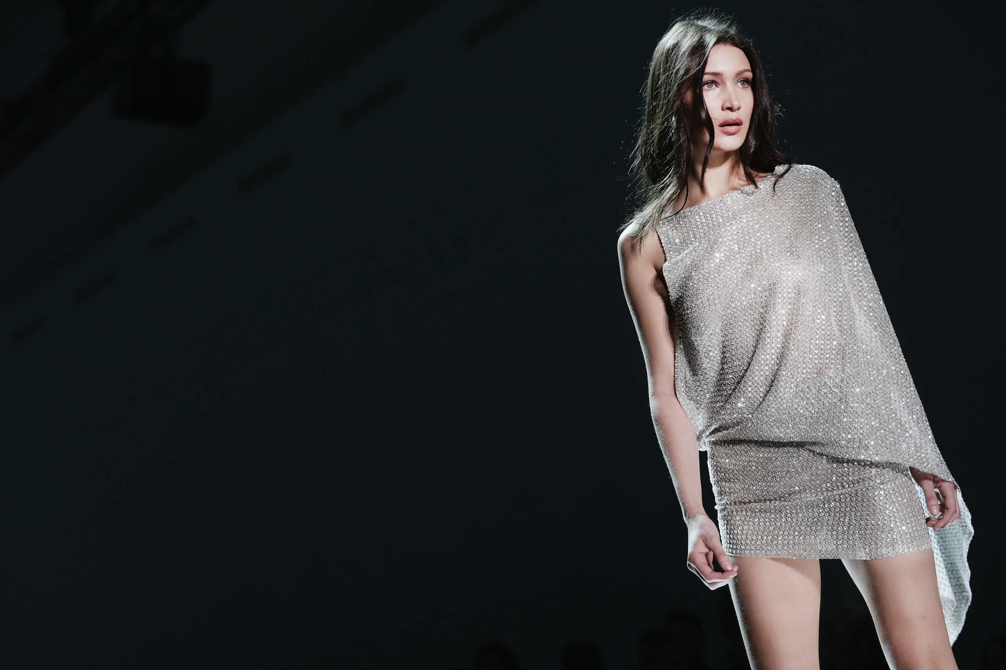 Bella Hadid on a runway HD Wallpaper