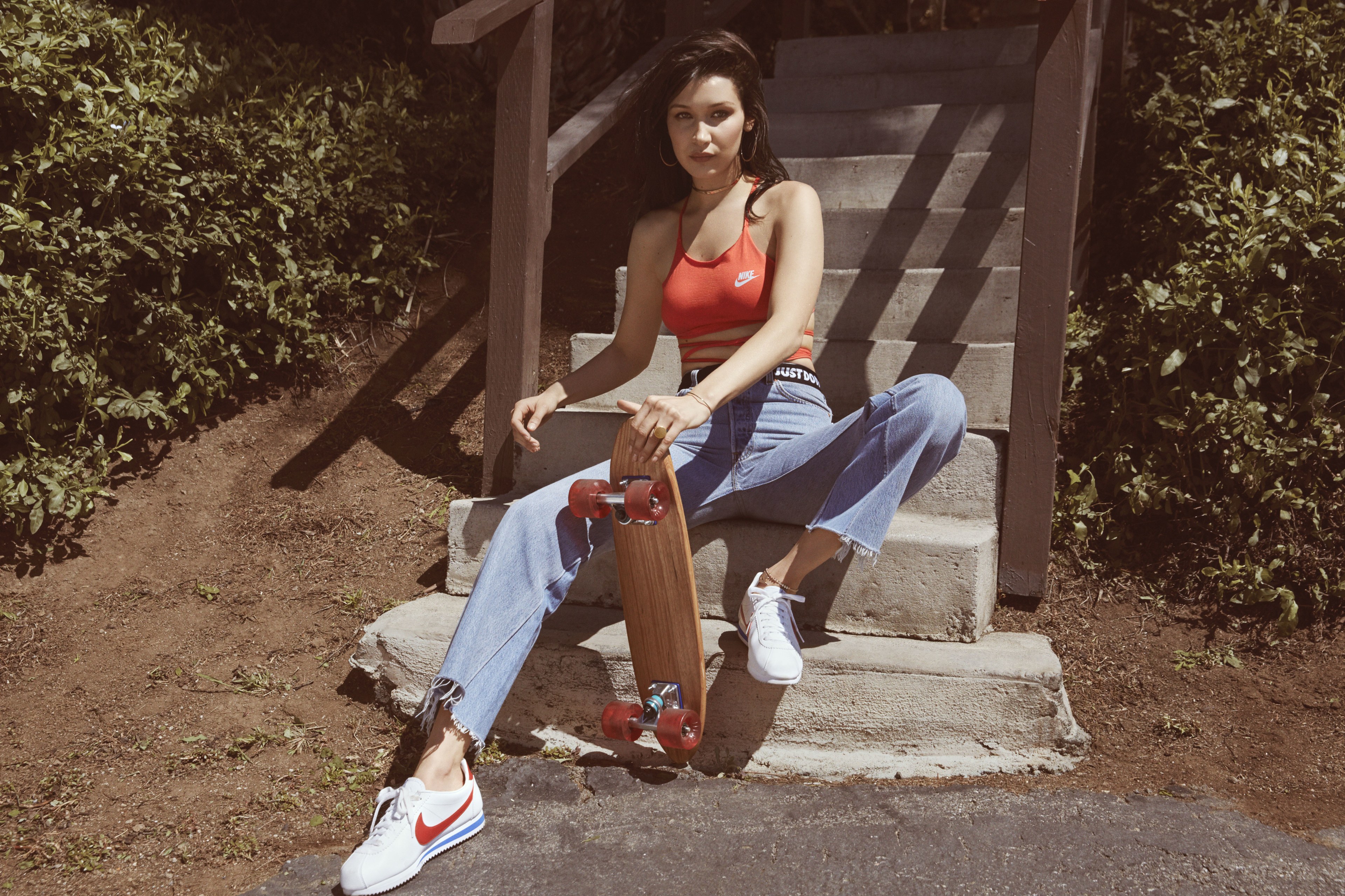 Bella Hadid with a skateboard HD Wallpaper