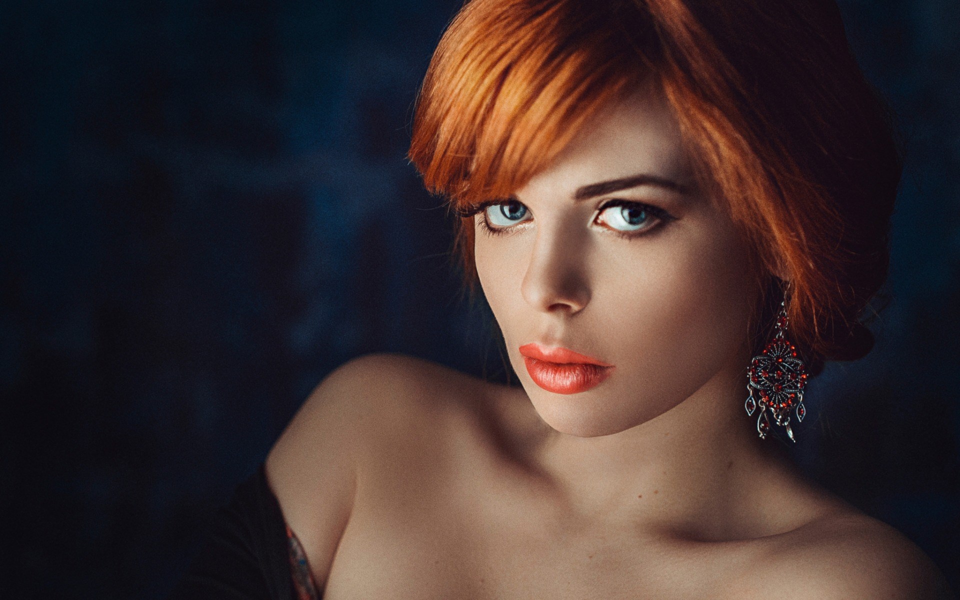 Woman with red hair and blue eyes wearing earring HD Wallpaper