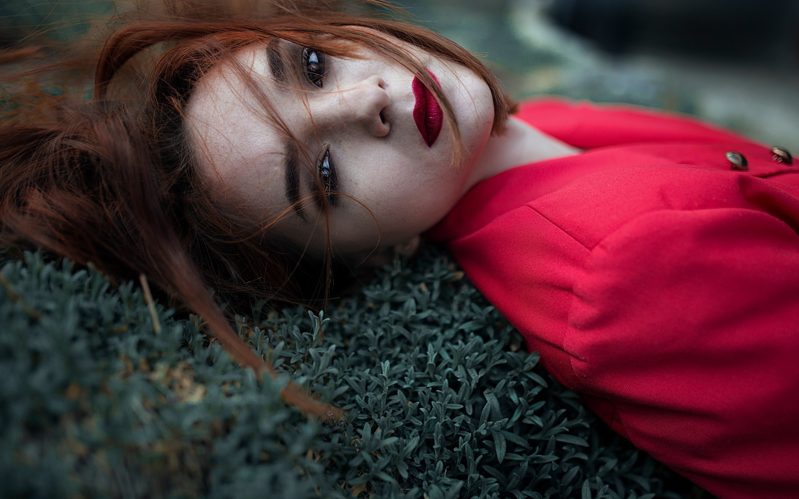 Woman in red jacket lying on grass HD Wallpaper