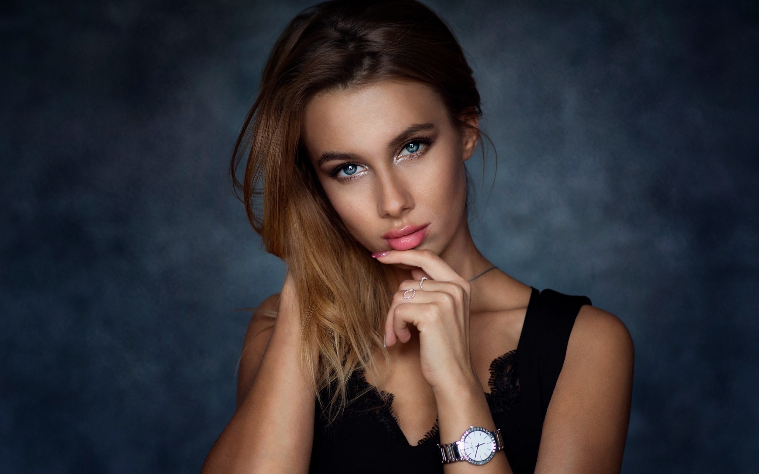 Woman with blue eyes and blonde hair wearing a black top HD Wallpaper