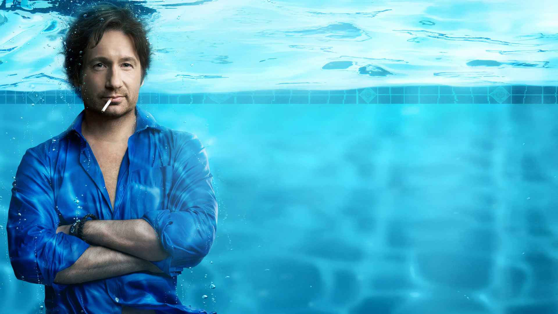 David Duchovny in a blue shirt underwater HD Wallpaper