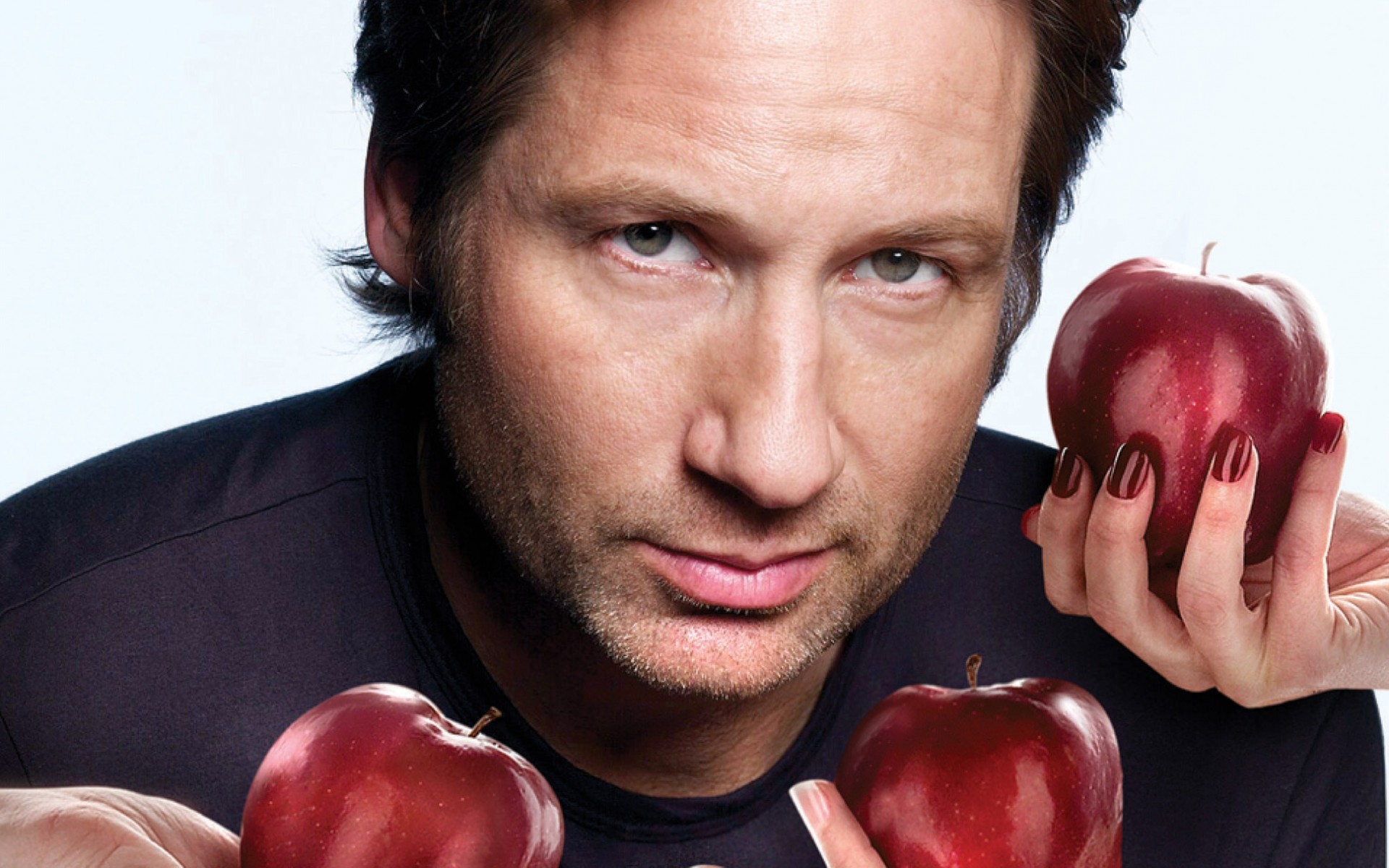 David Duchovny with red apples HD Wallpaper