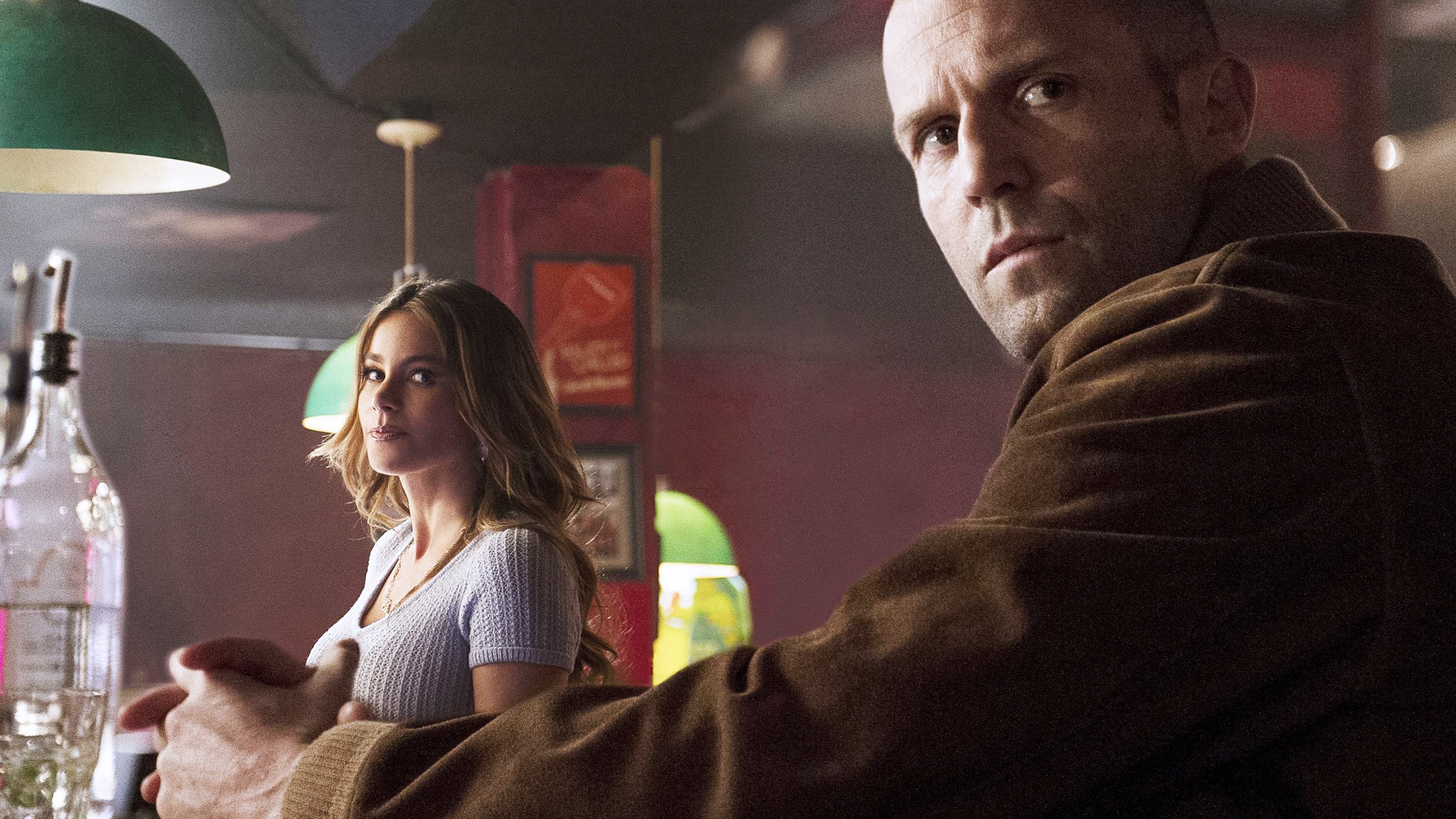 Sofia Vergara and Jason Statham in a bar HD Wallpaper