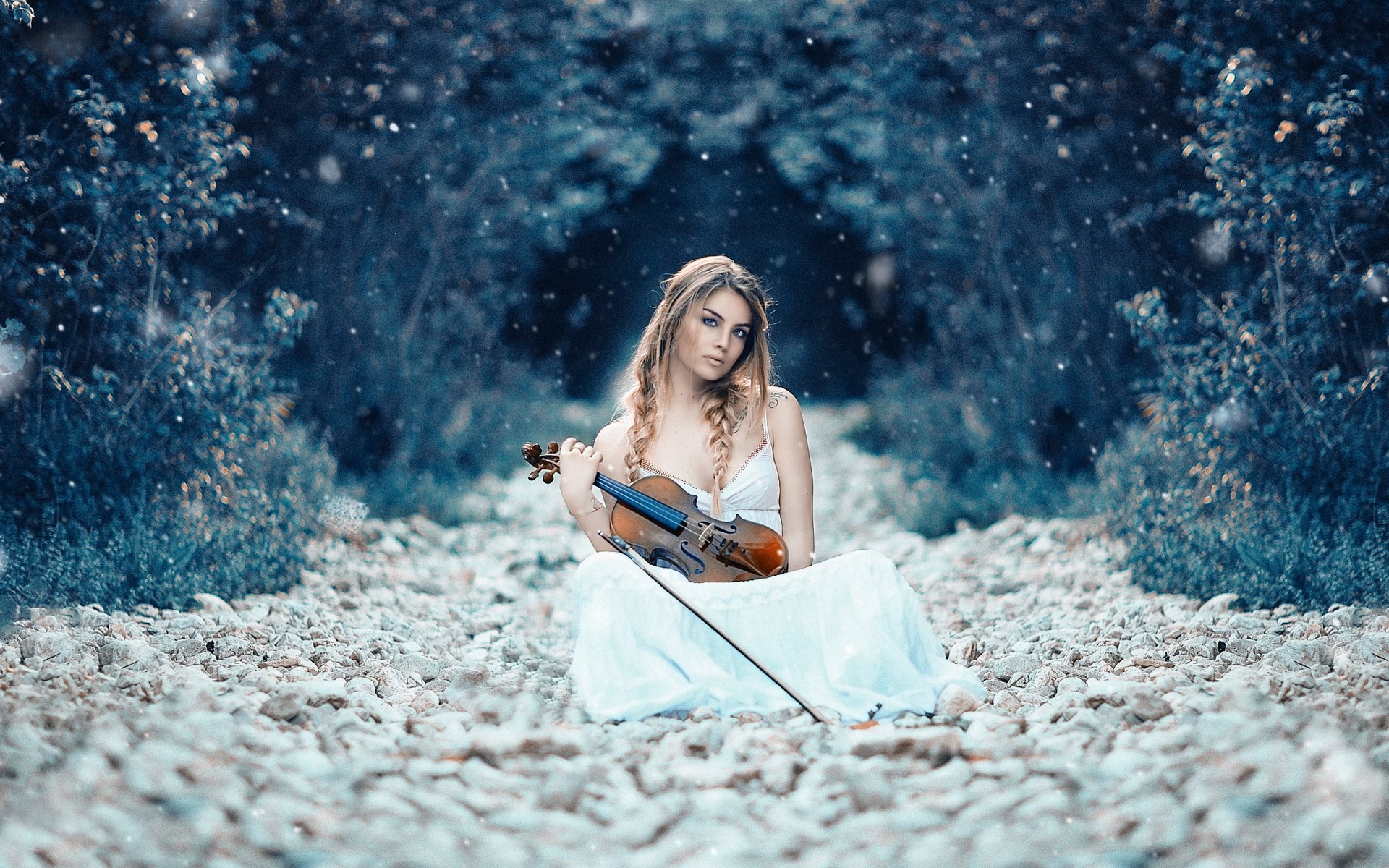 Woman with violin in a snowy forest HD Wallpaper