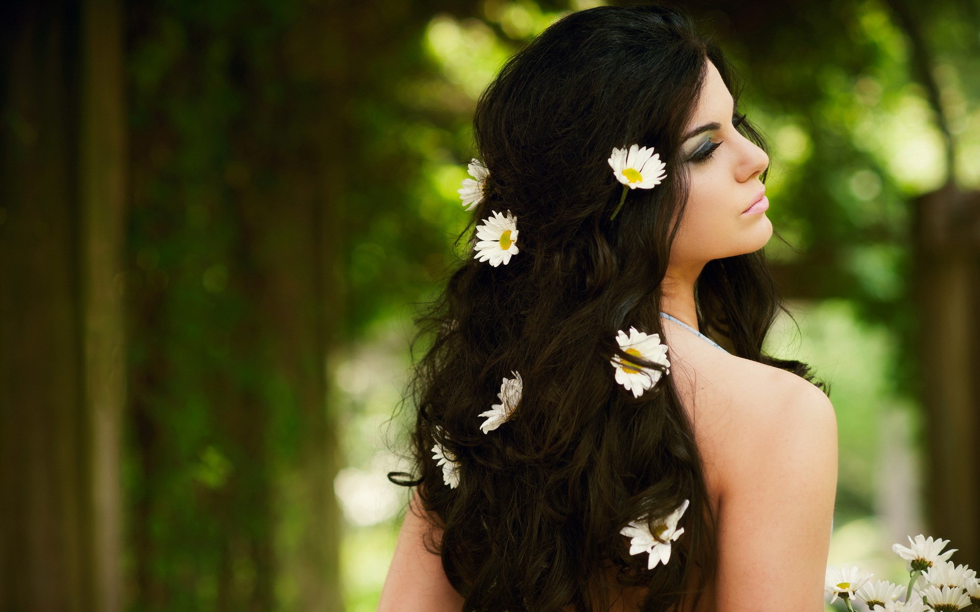 Woman with flowers in her hair HD Wallpaper