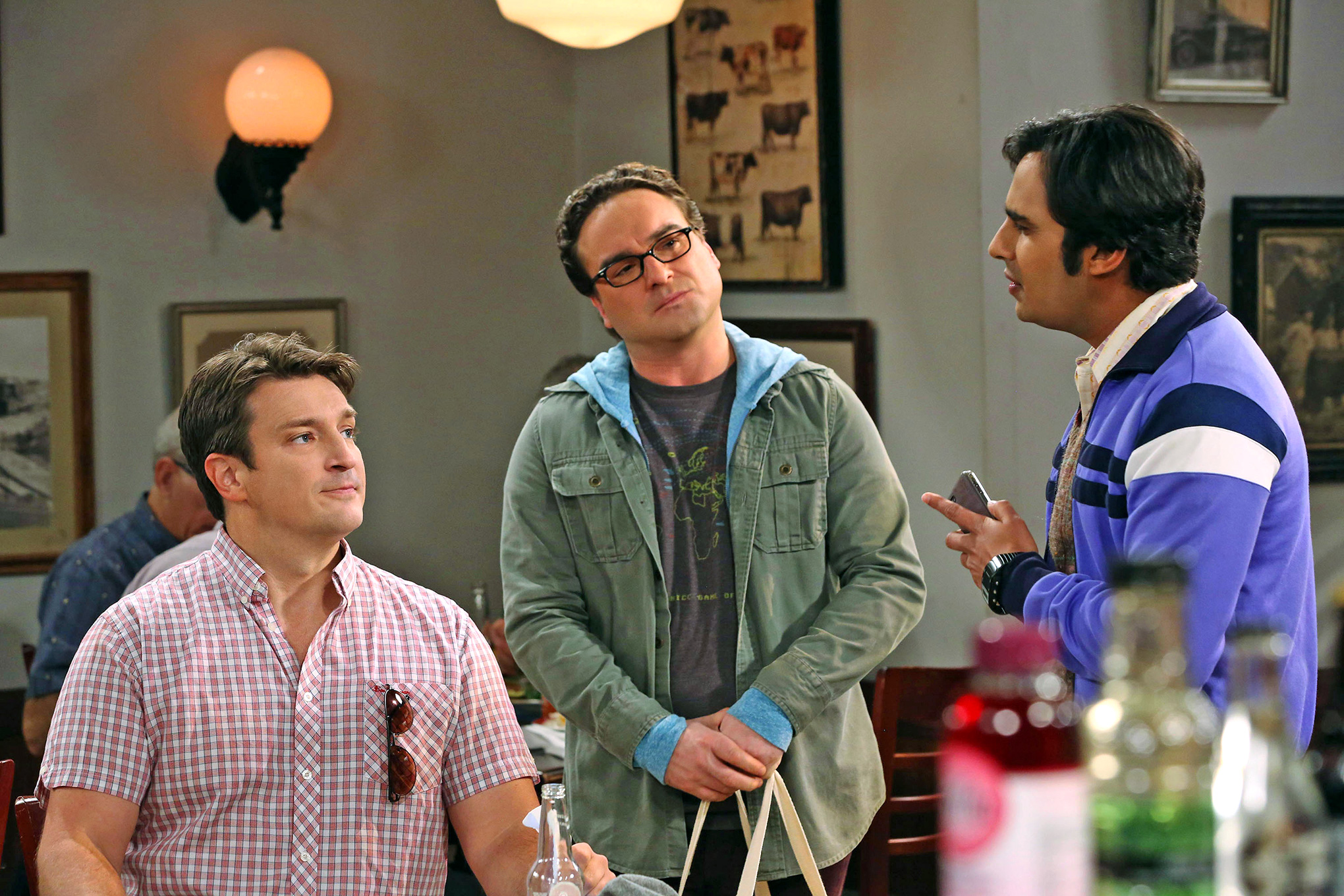 Nathan Fillion and two men in a restaurant HD Wallpaper