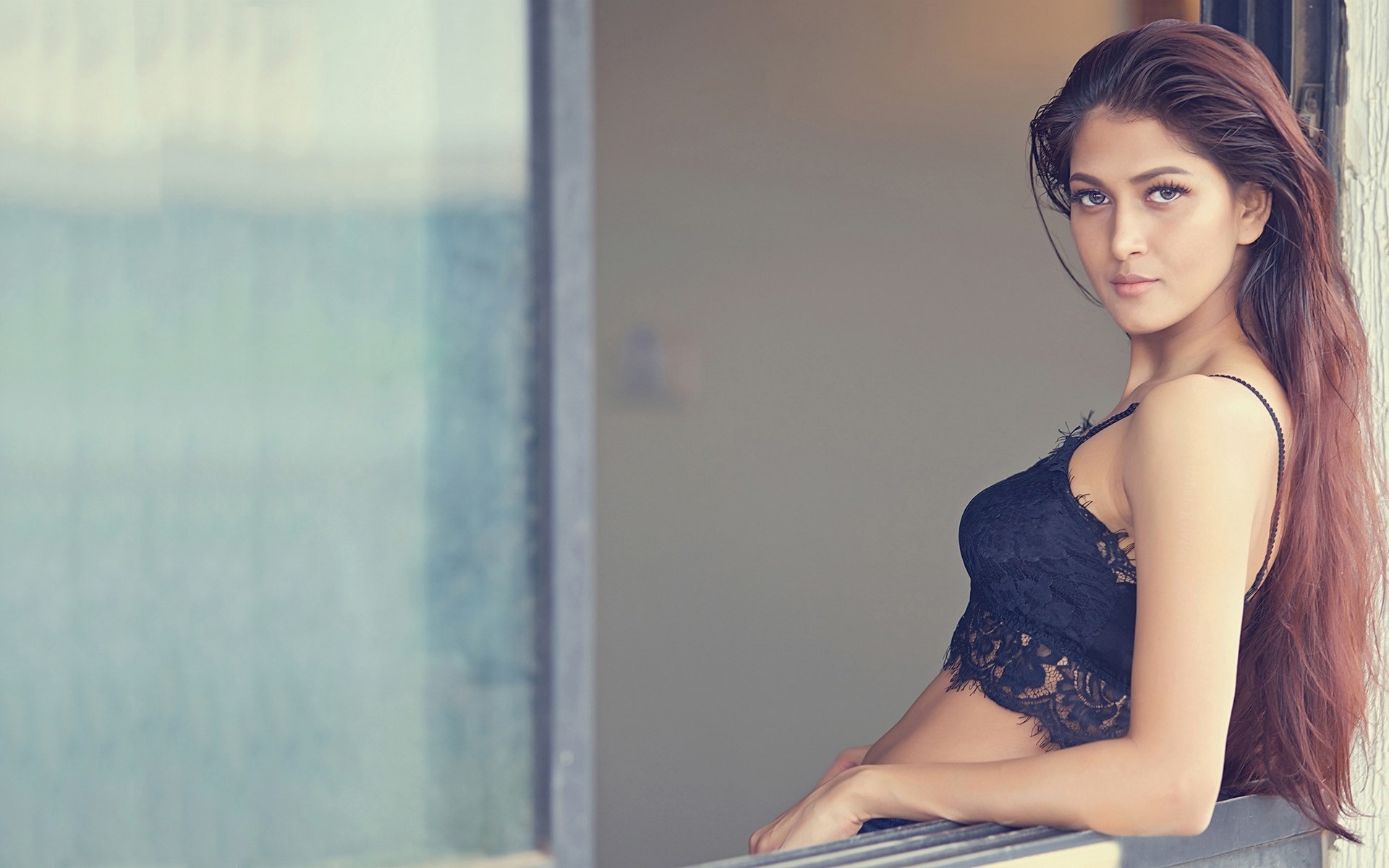 Woman in black lace top by window HD Wallpaper