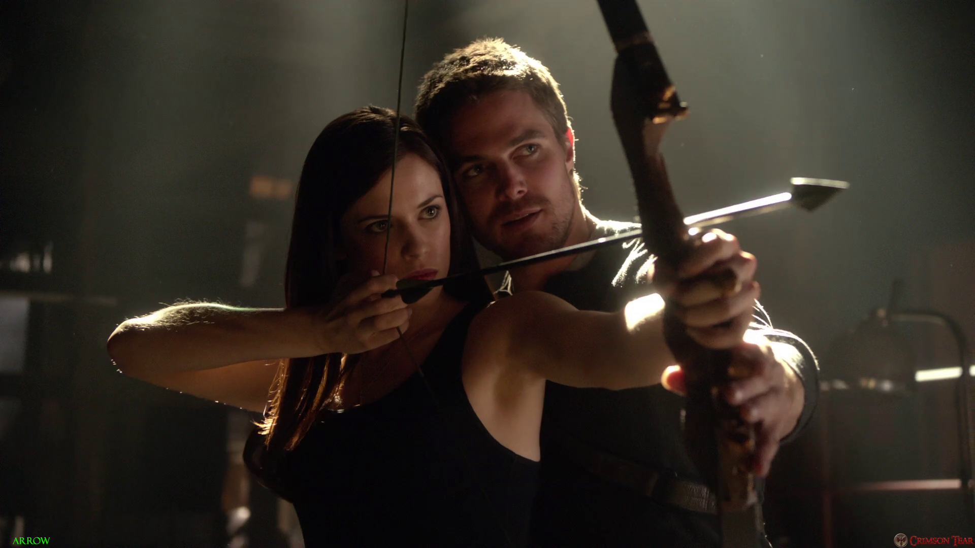 Arrow: Oliver Queen and Laurel Lance with bow and arrow HD Wallpaper