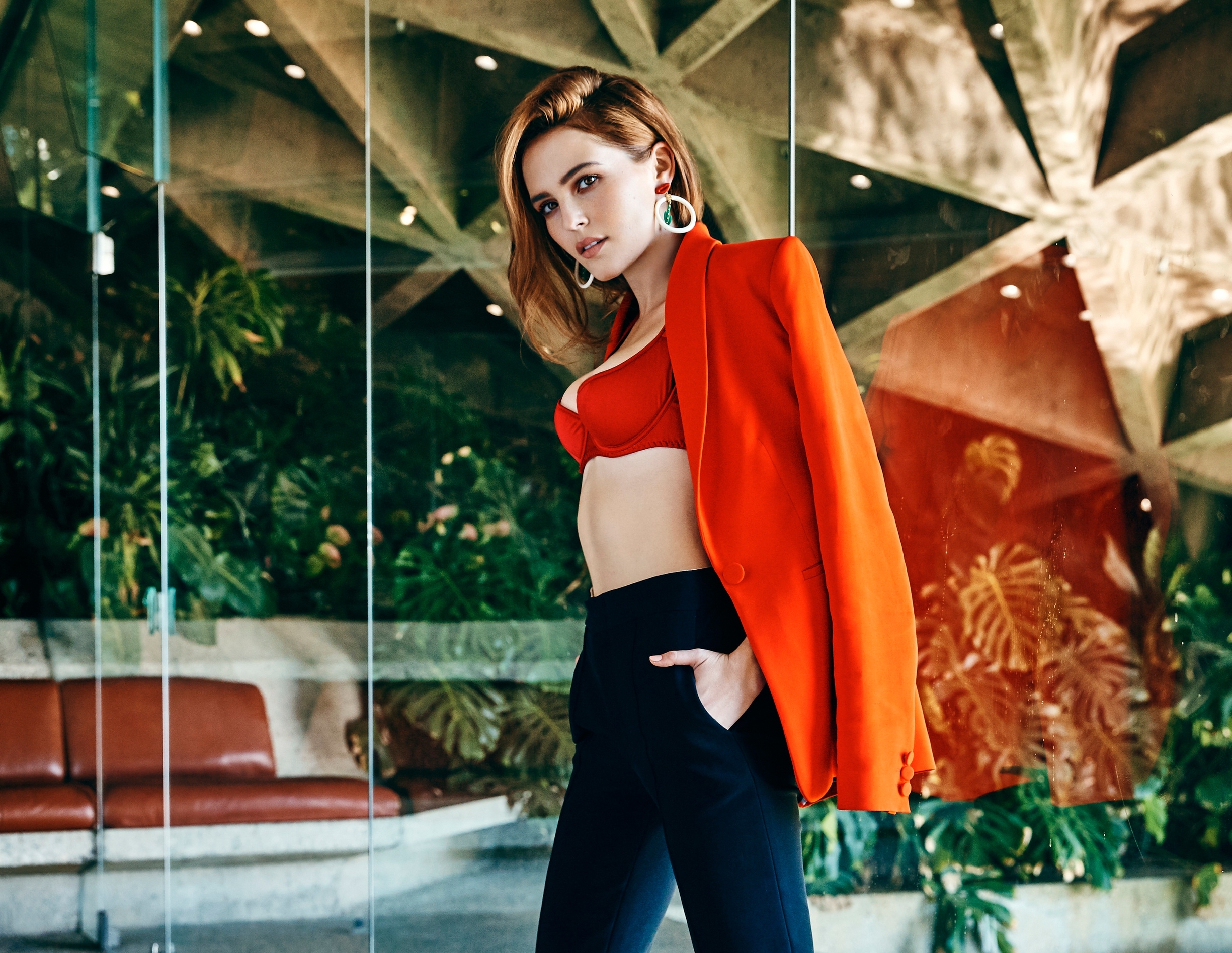 Zoey Deutch in red bra and orange blazer HD Wallpaper