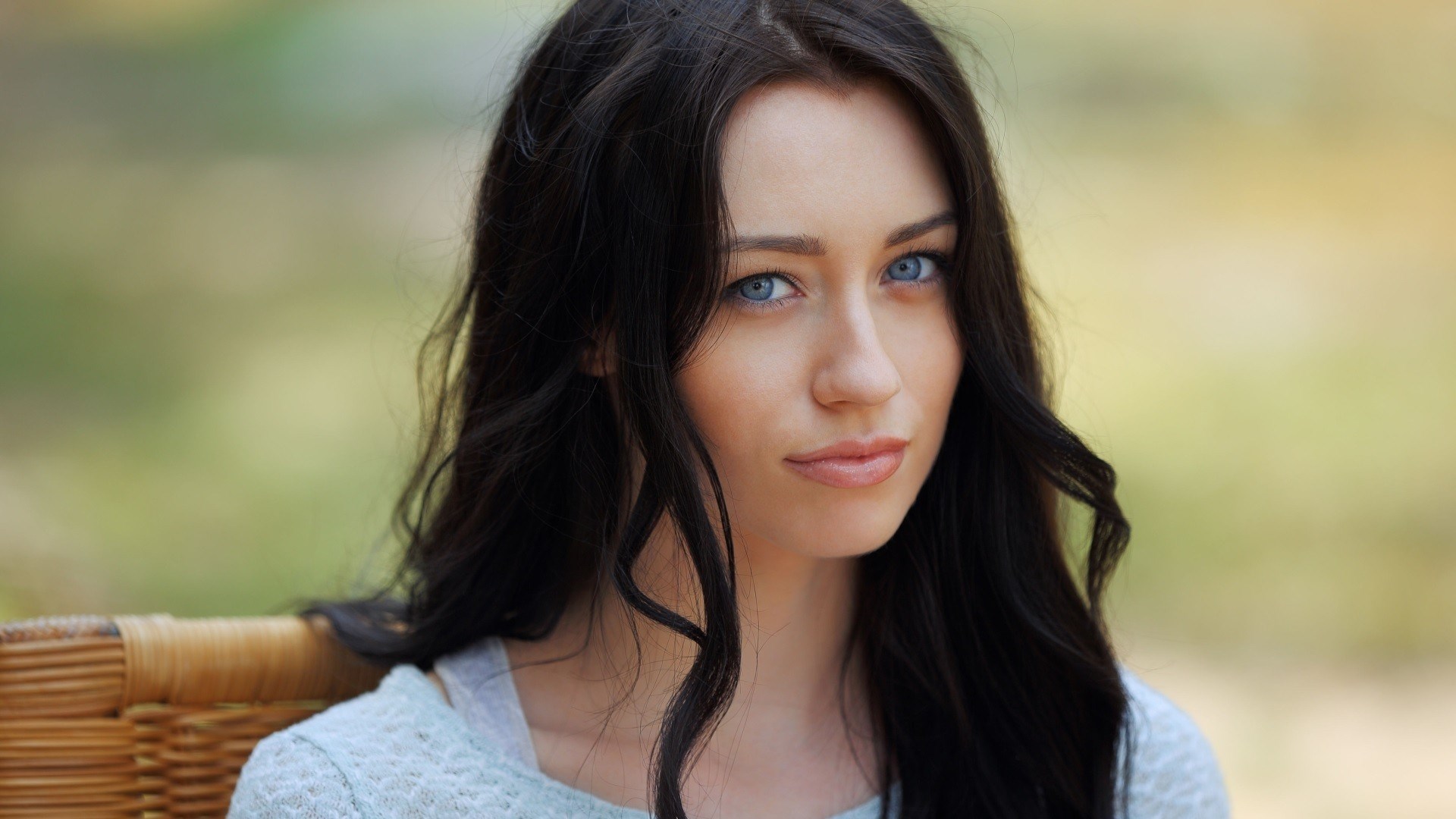 Woman with dark hair and blue eyes HD Wallpaper