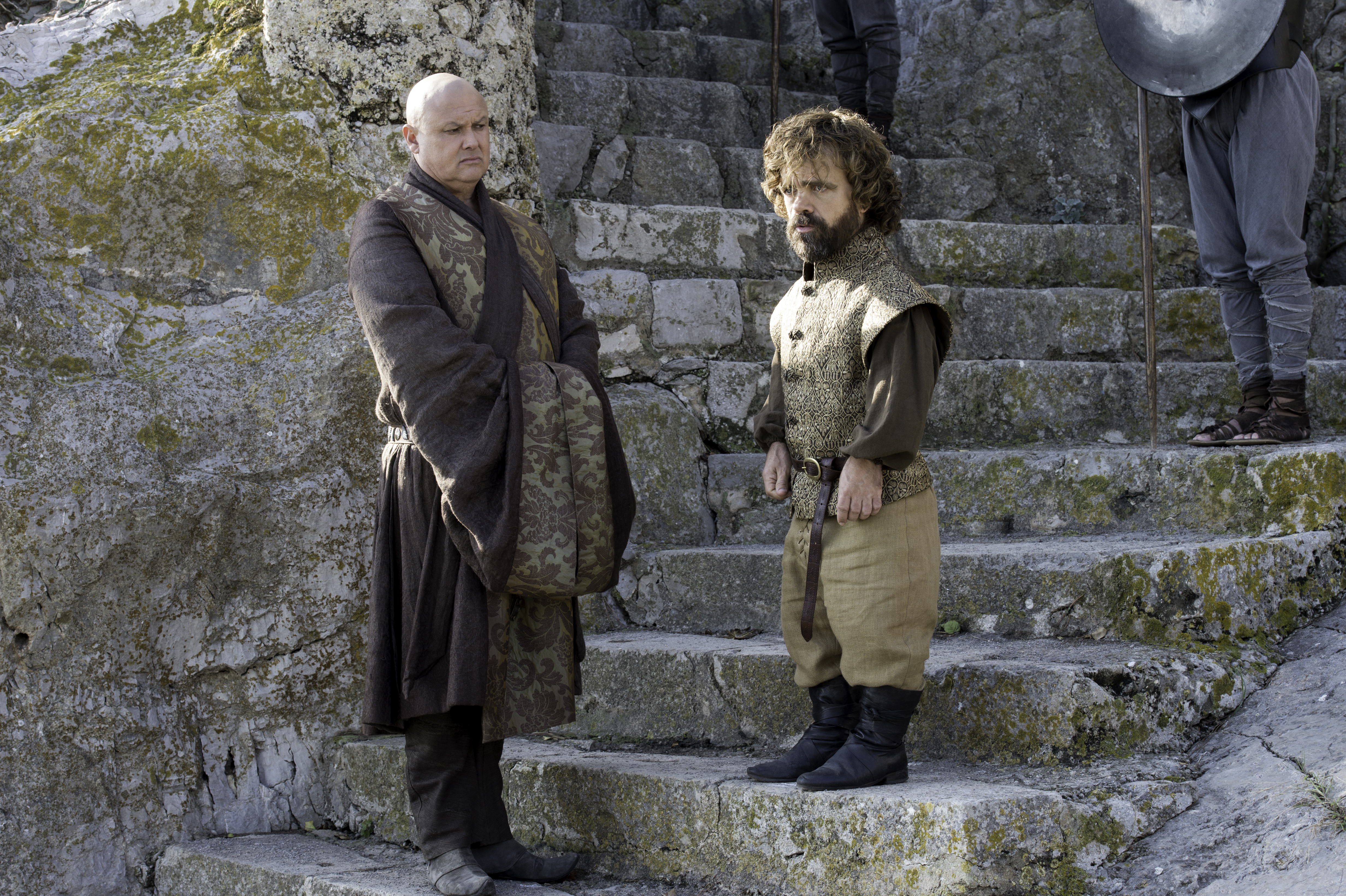Lord Varys and Tyrion Lannister on stone steps HD Wallpaper