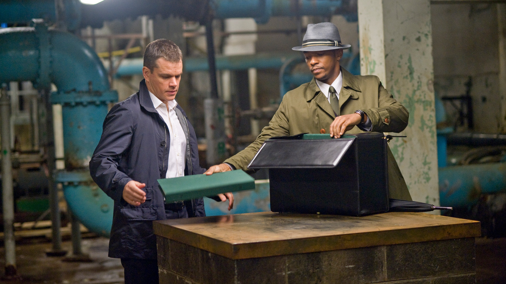 Matt Damon and Anthony Mackie in a dark room HD Wallpaper
