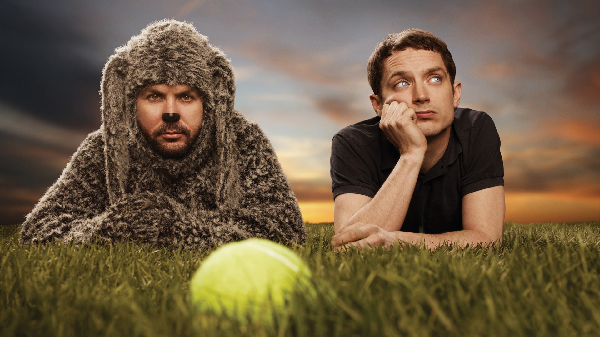 Elijah Wood and man in bear costume HD Wallpaper