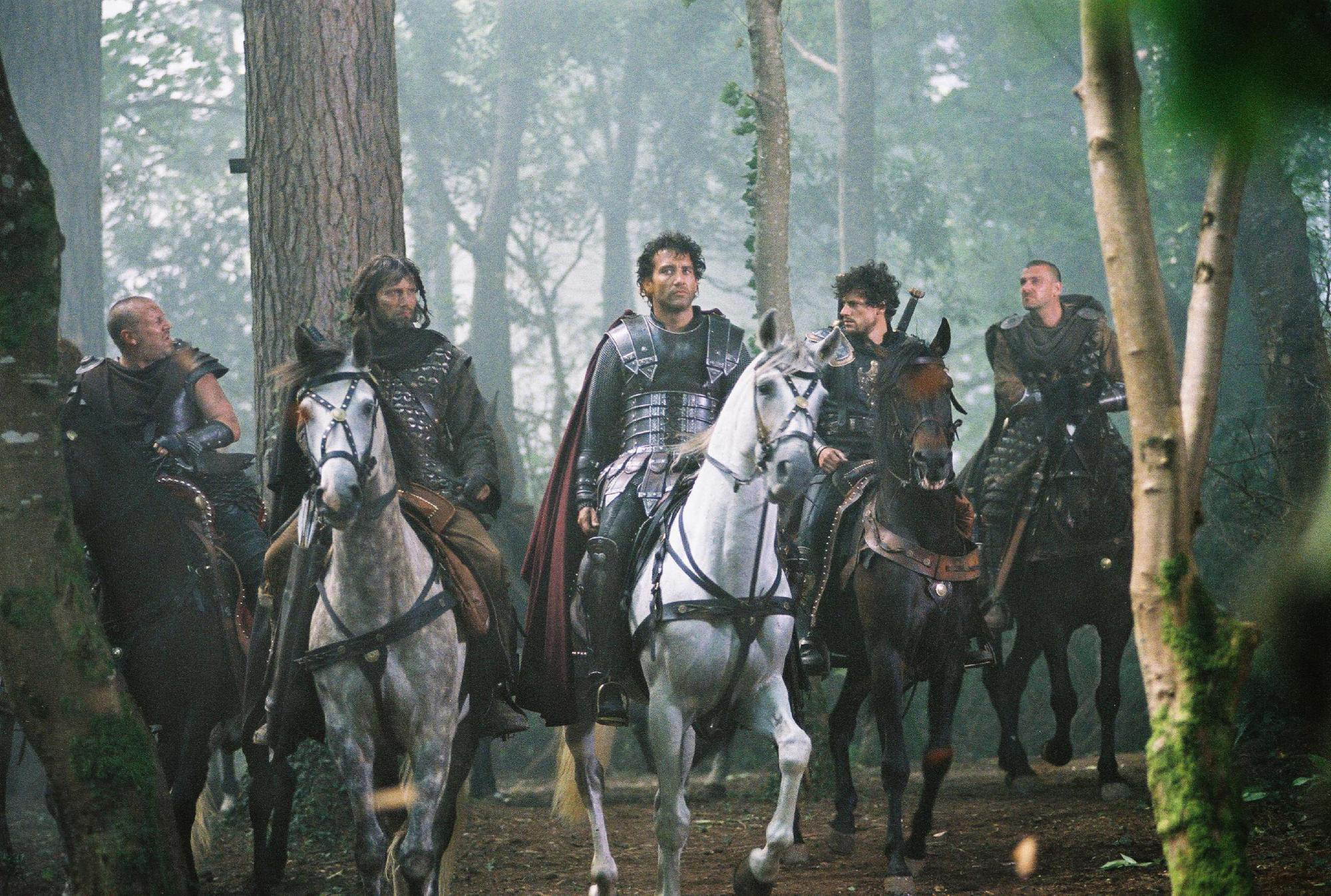 Five men on horseback in a forest HD Wallpaper