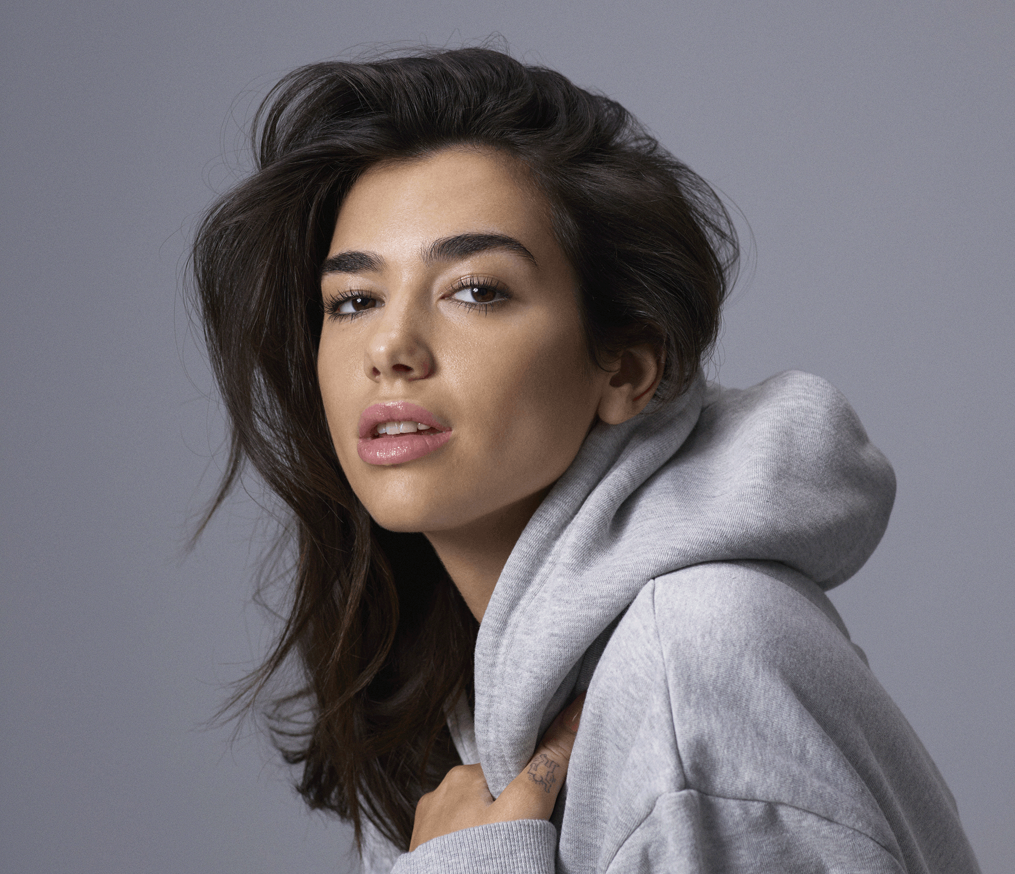 Dua Lipa in a grey hoodie HD Wallpaper