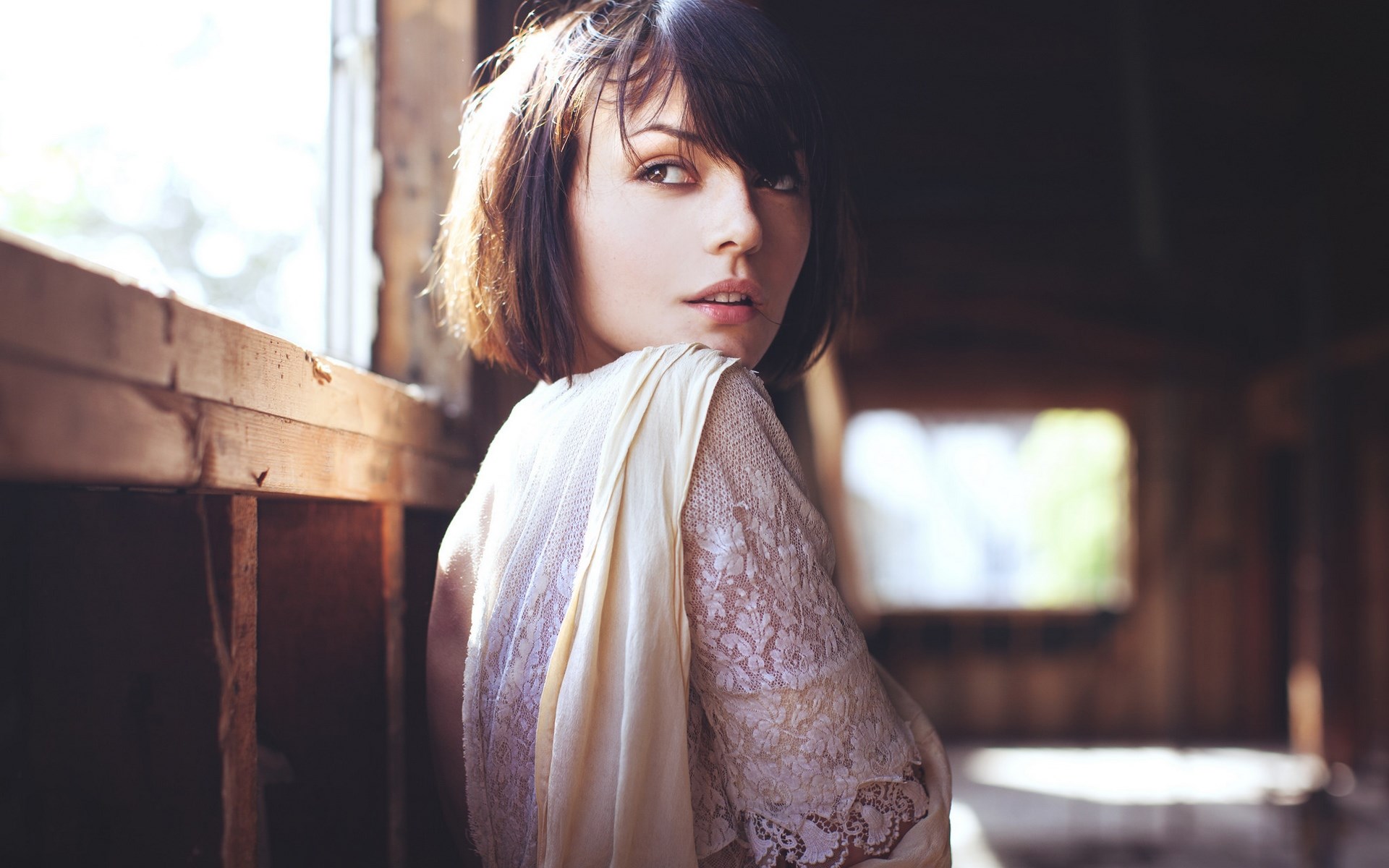 Woman in lace dress by window HD Wallpaper