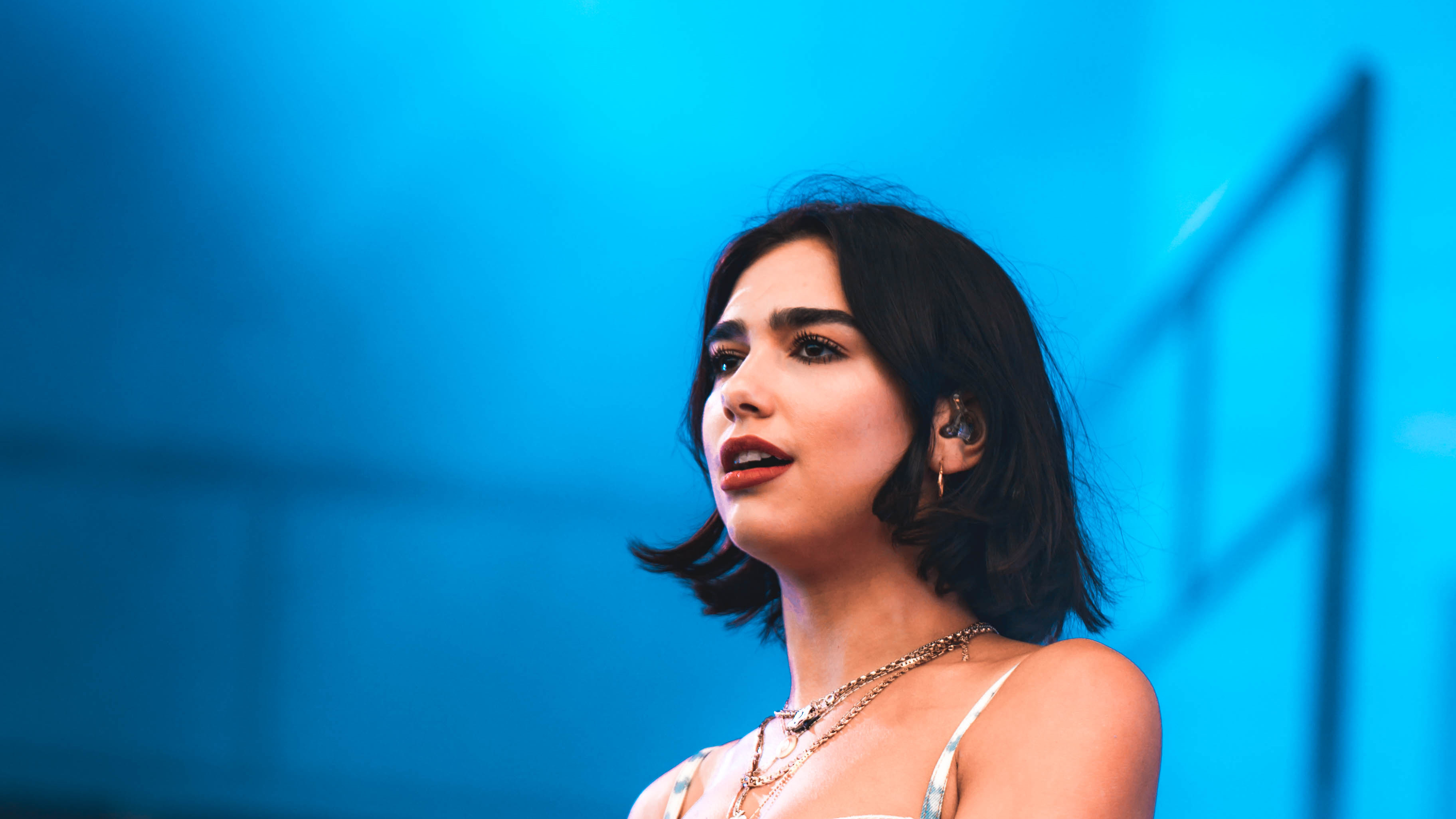 Dua Lipa performing on stage HD Wallpaper