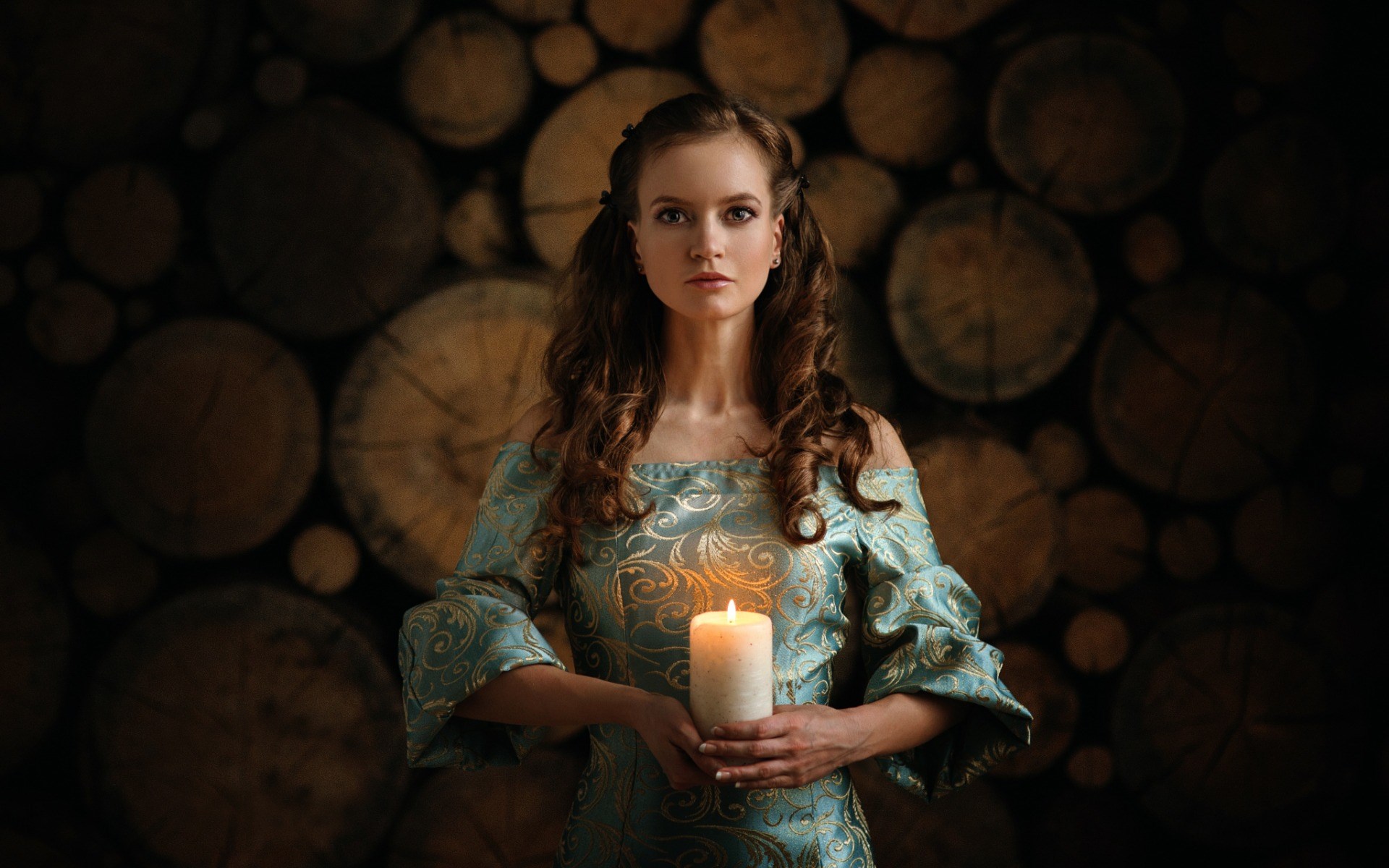 Woman in historical dress holding a candle HD Wallpaper