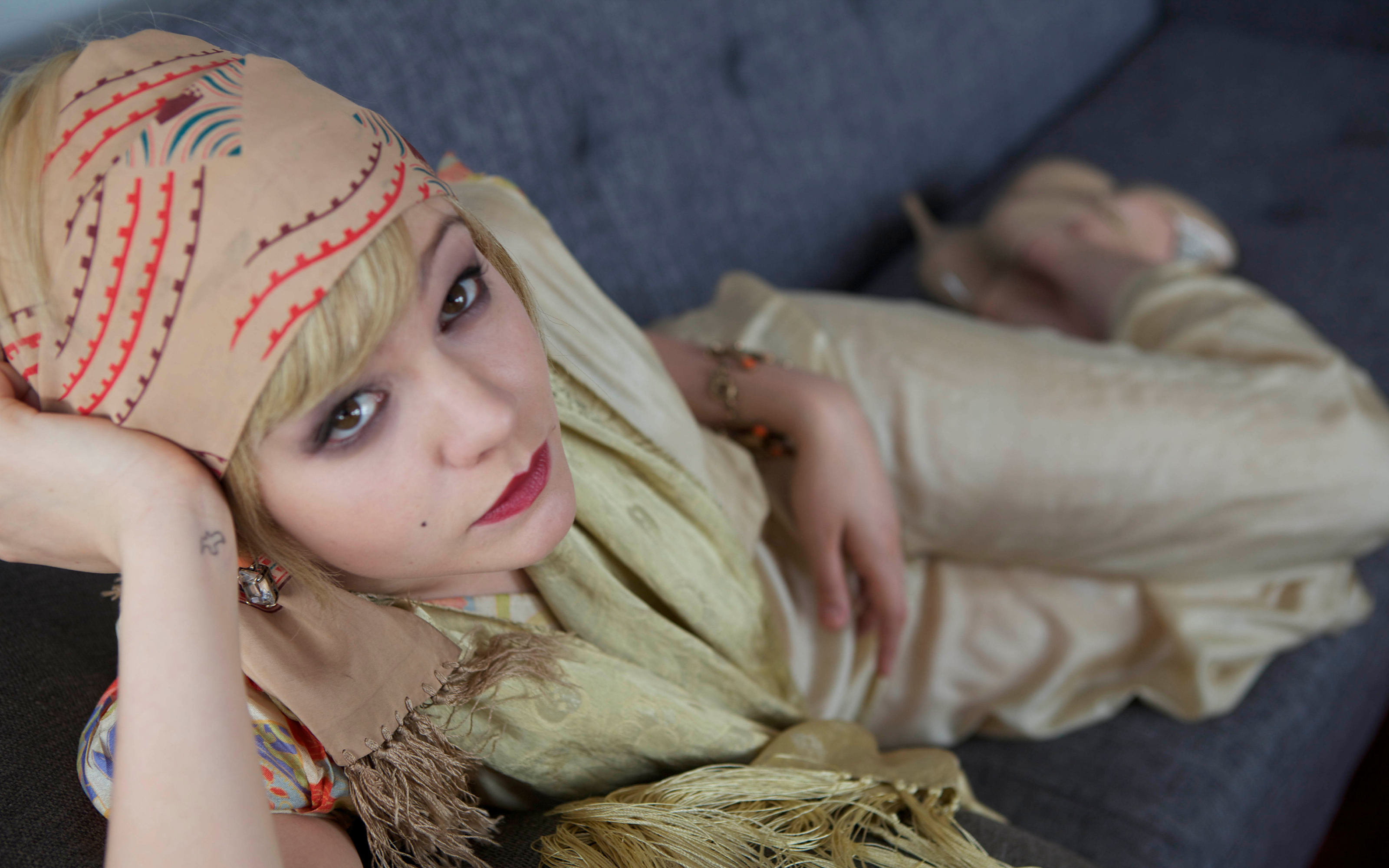 Carey Mulligan lying on a couch HD Wallpaper