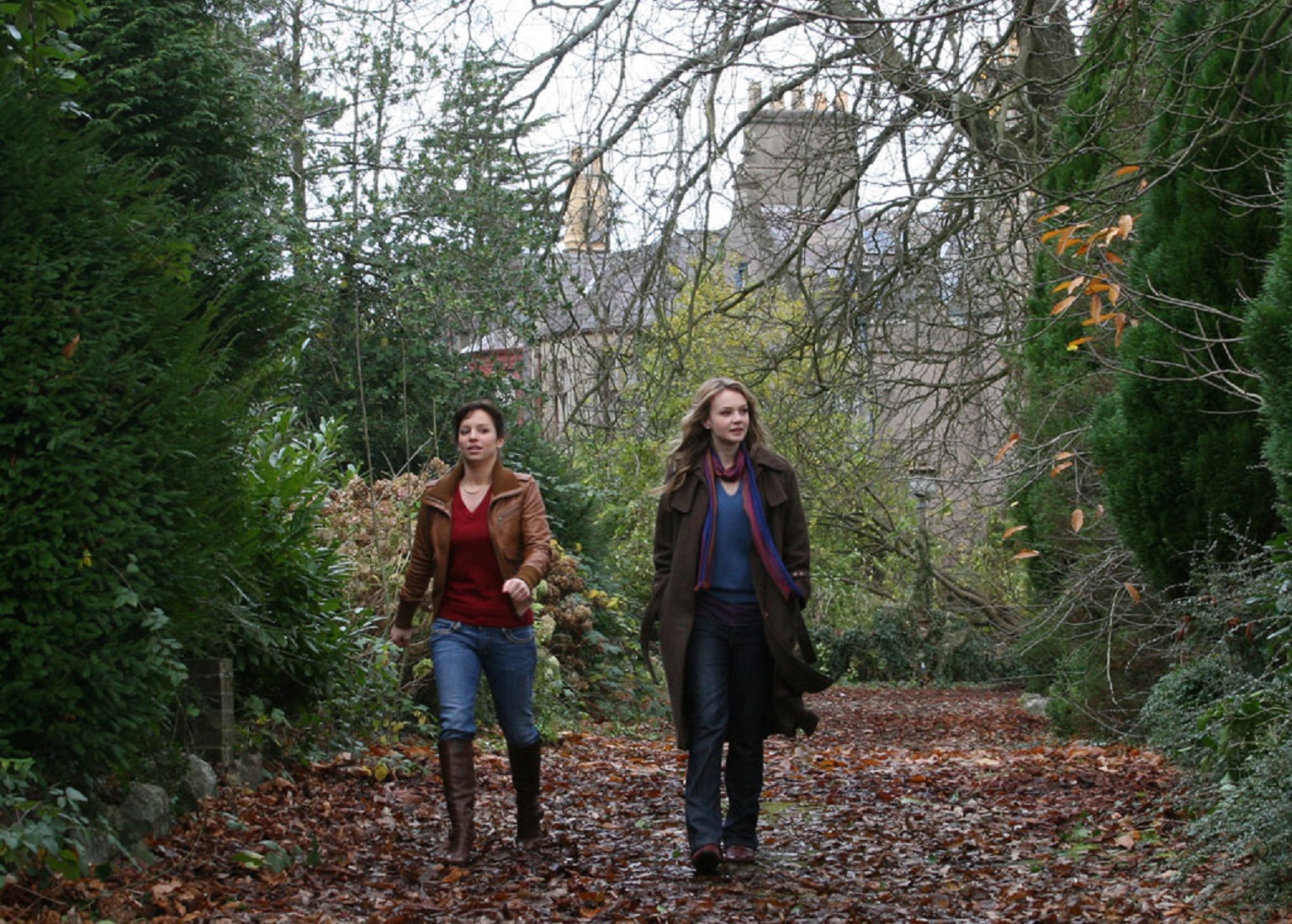 Carey Mulligan walking in a park HD Wallpaper