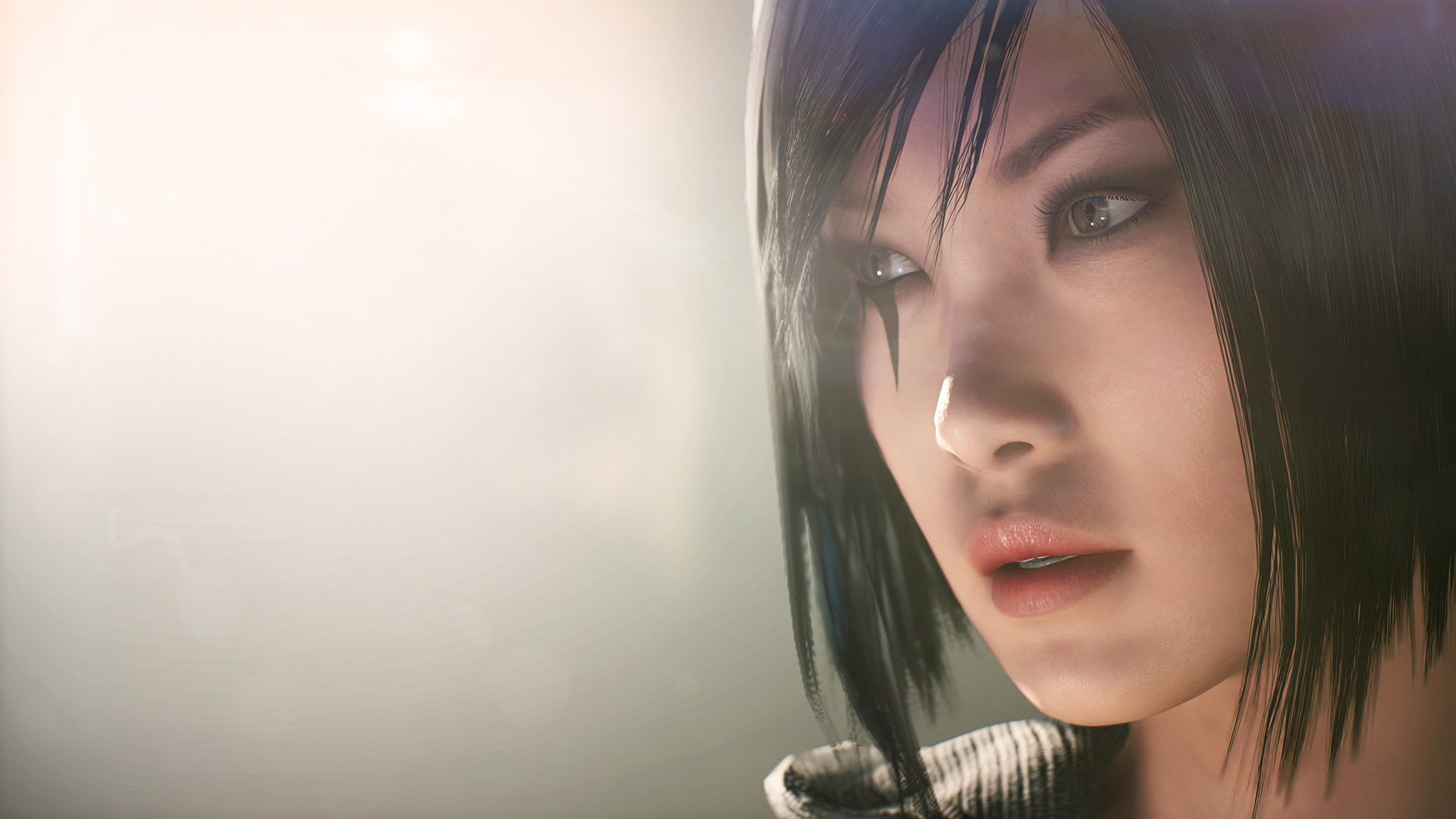 Close-up of a woman's face with dark hair HD Wallpaper