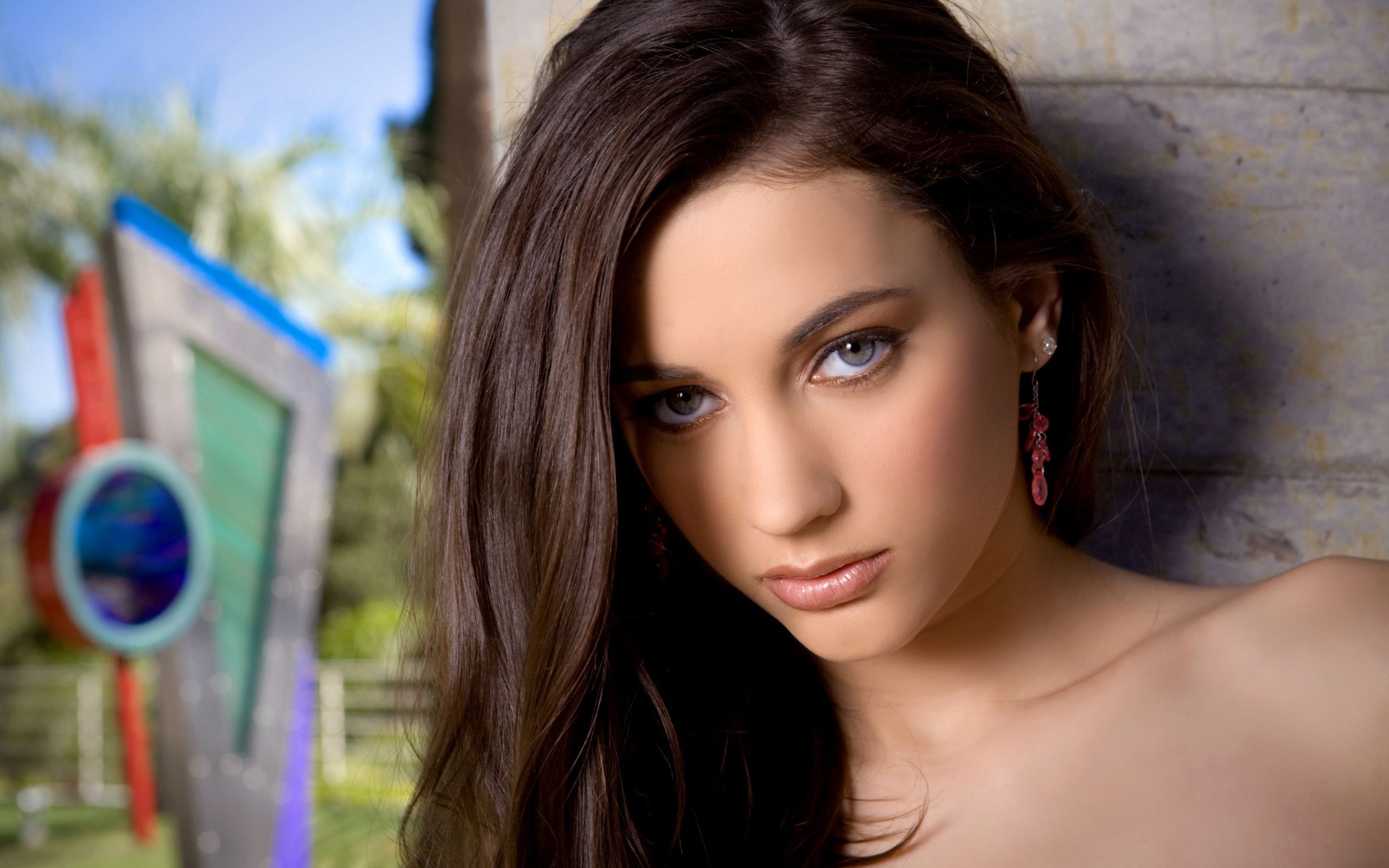 Woman with long brown hair and blue eyes HD Wallpaper