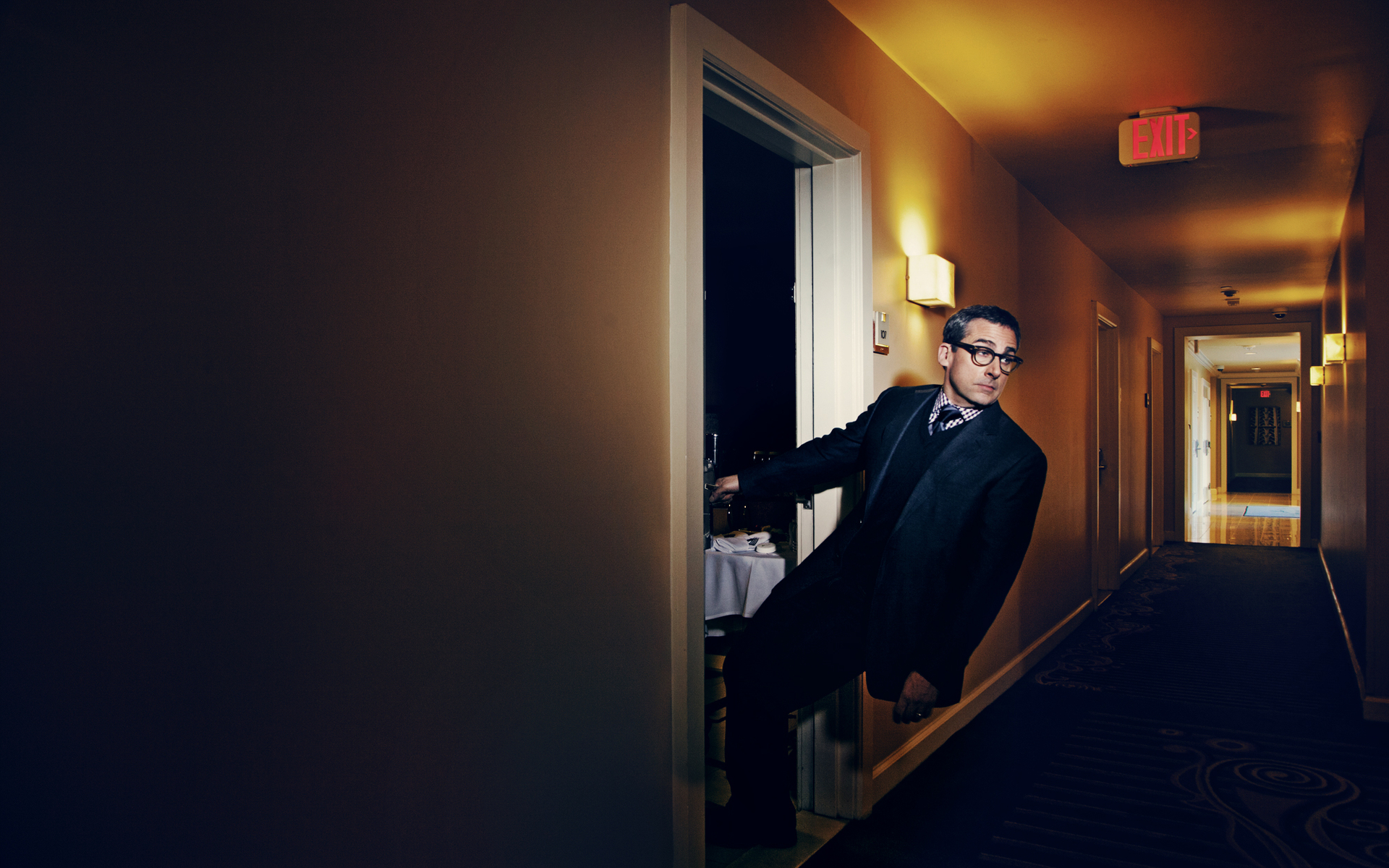 Steve Carell in a hotel hallway HD Wallpaper