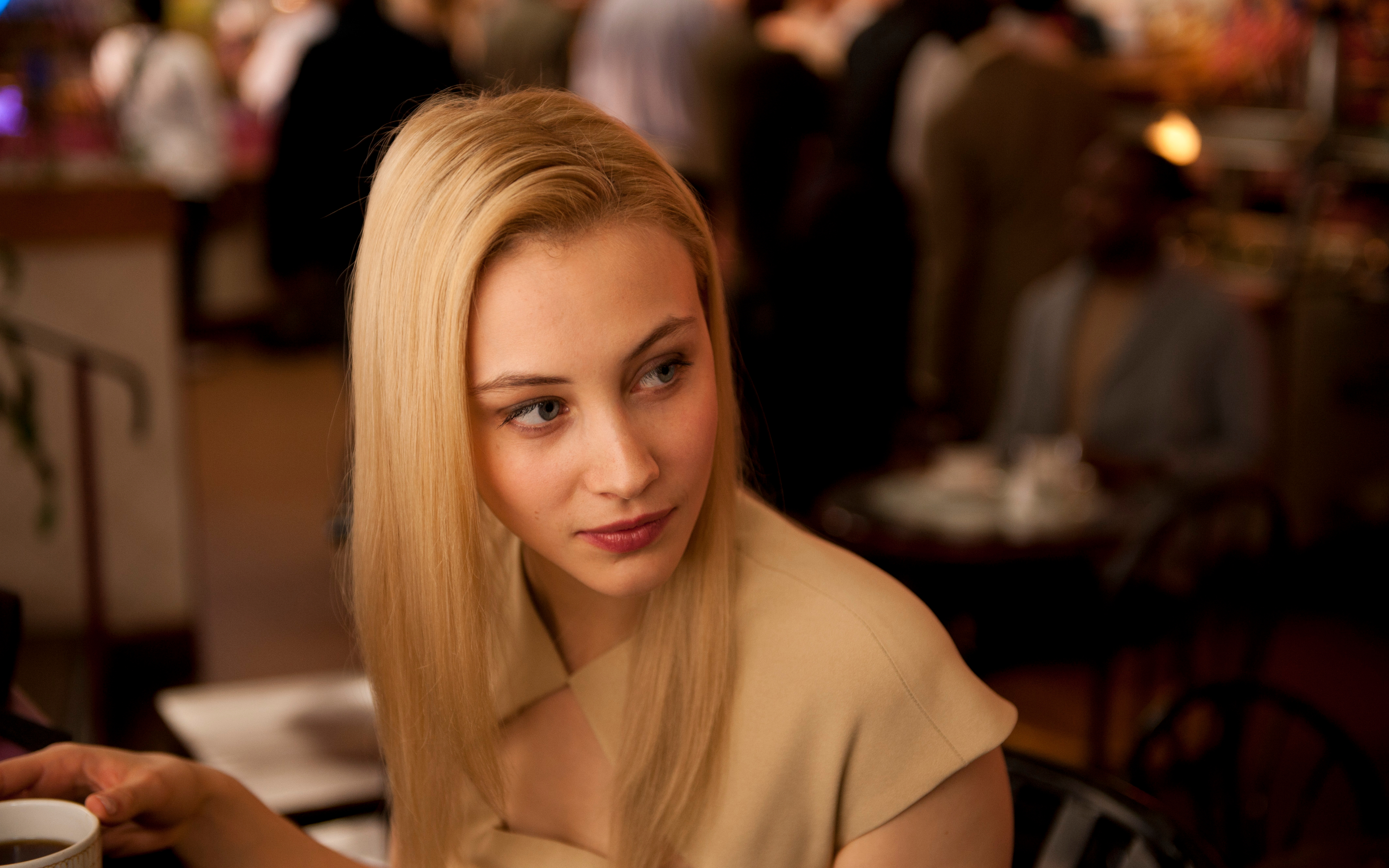 Sarah Gadon in a cafe HD Wallpaper