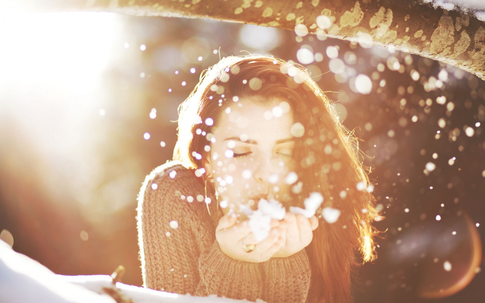 Woman blowing snow in a winter forest HD Wallpaper