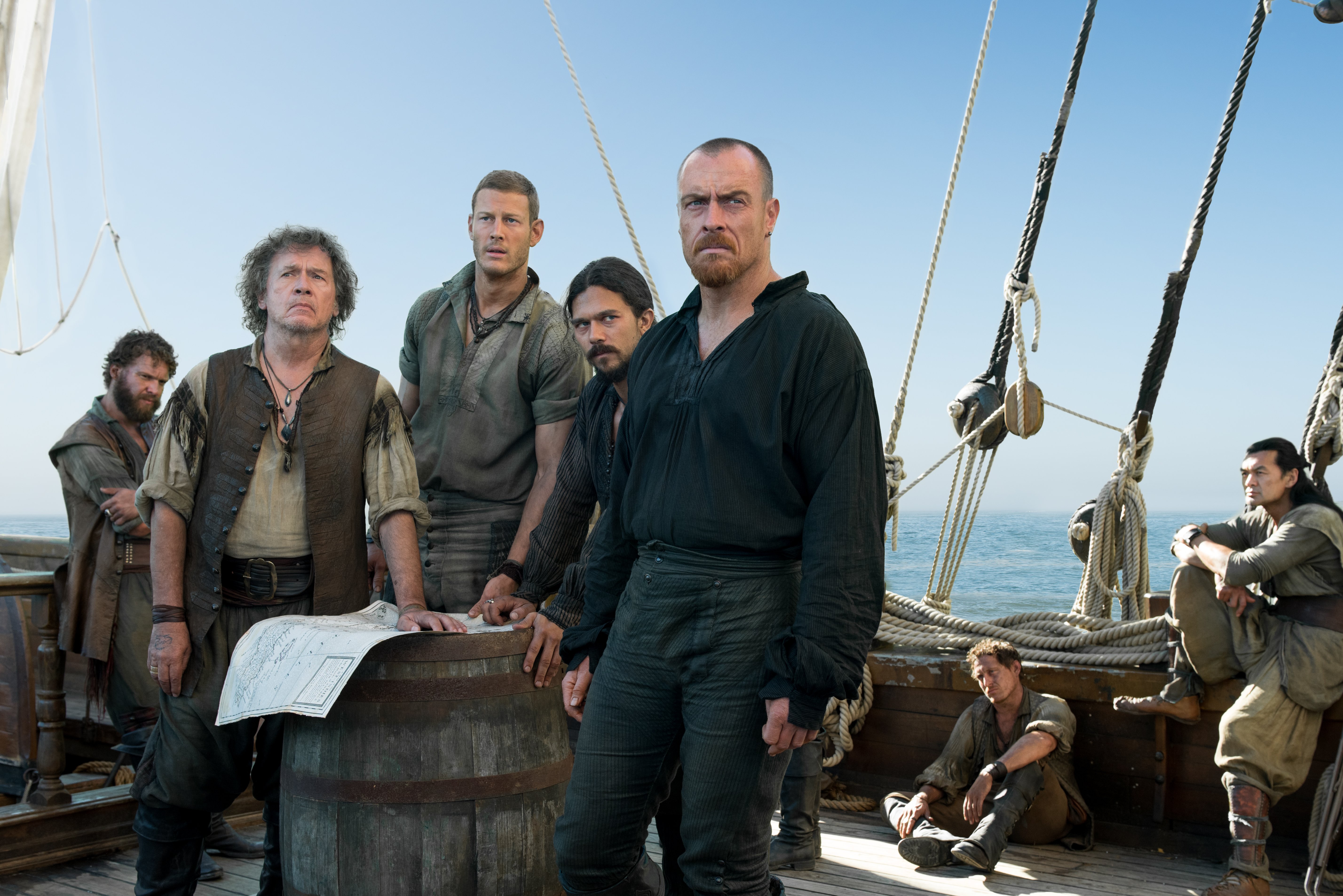 Toby Stephens and crew on a ship deck HD Wallpaper