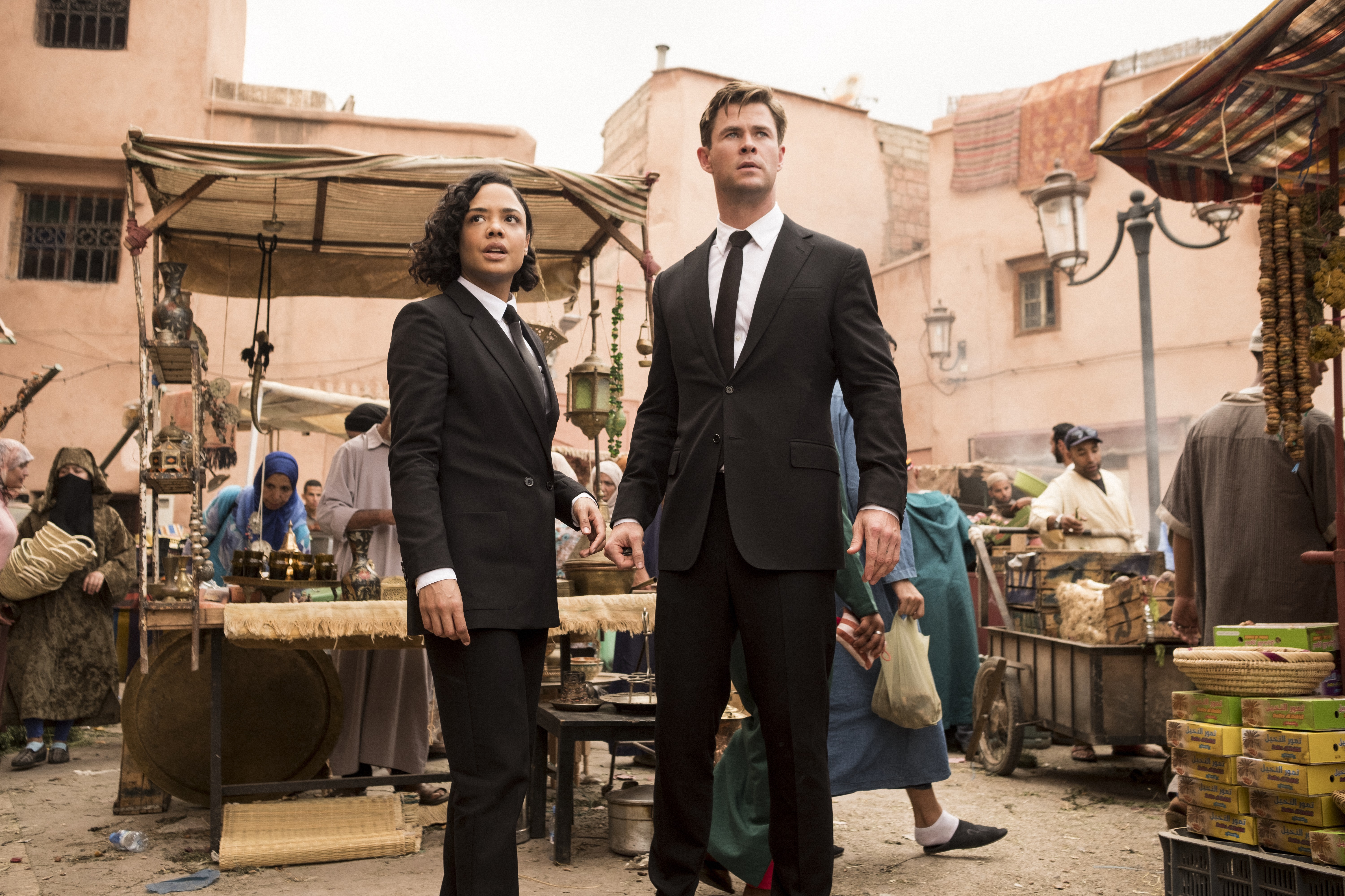 Tessa Thompson and Chris Hemsworth in Men in Black: International HD Wallpaper