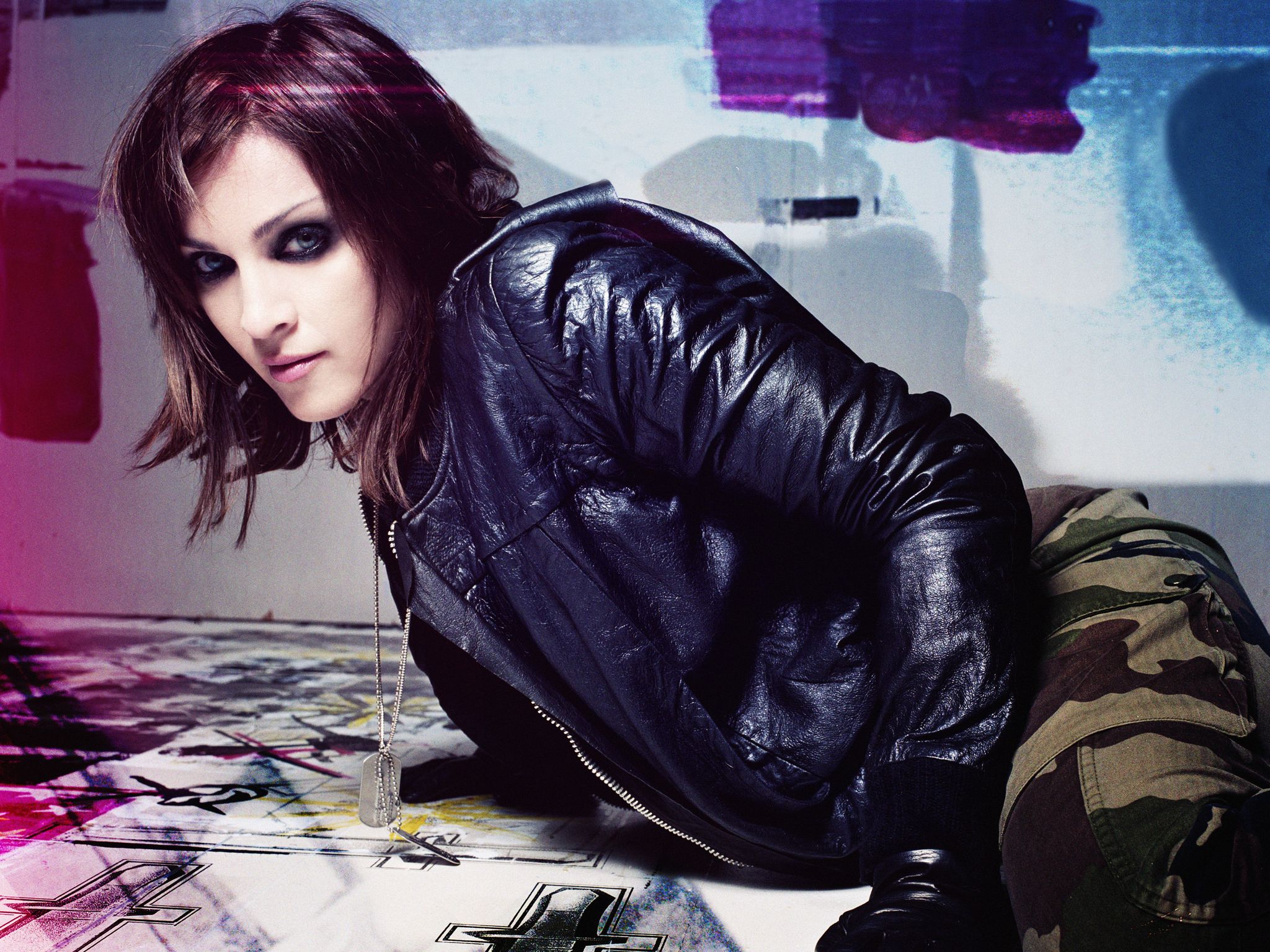 Madonna in leather jacket and camouflage pants HD Wallpaper