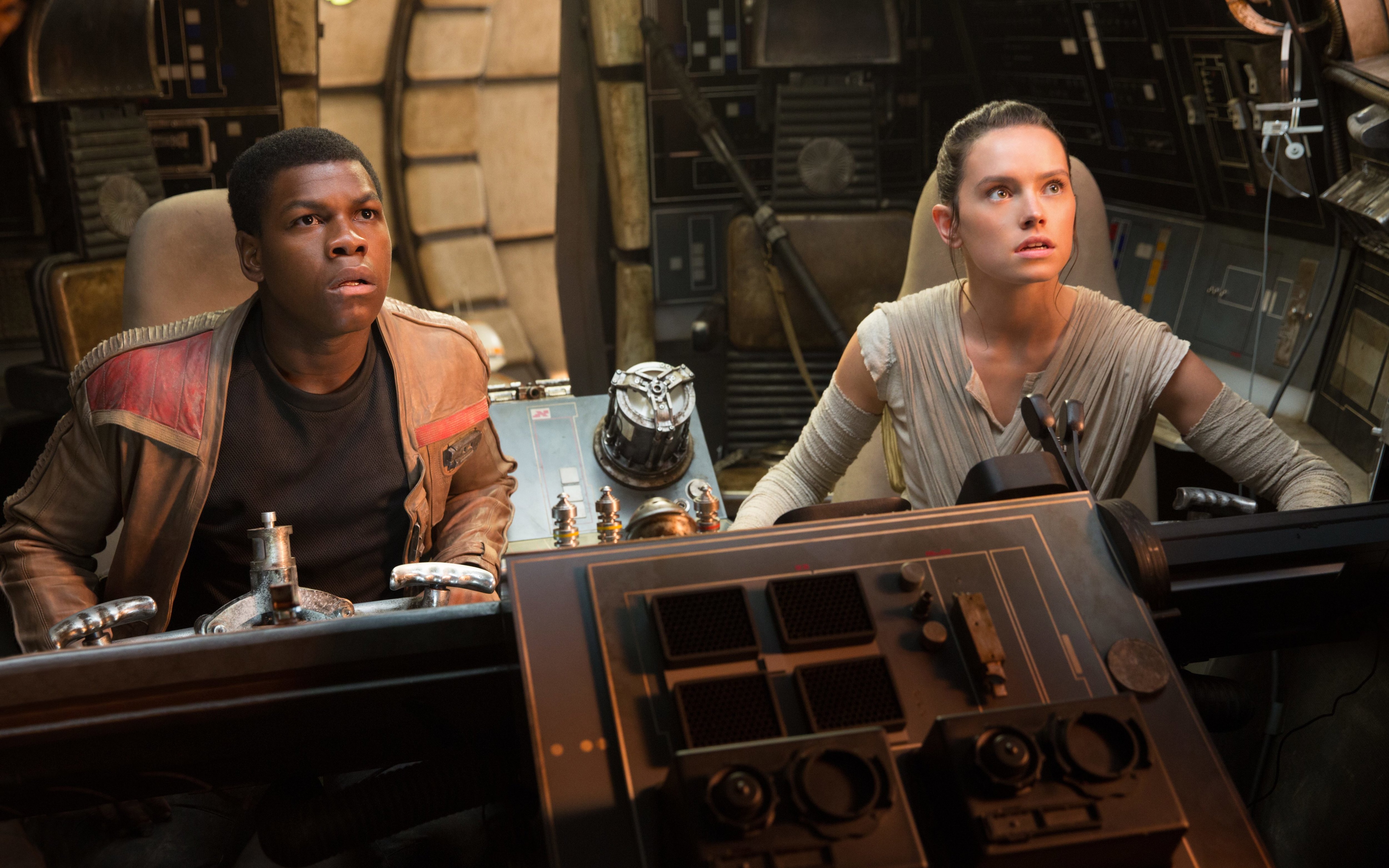 Finn and Rey in the Millennium Falcon cockpit HD Wallpaper