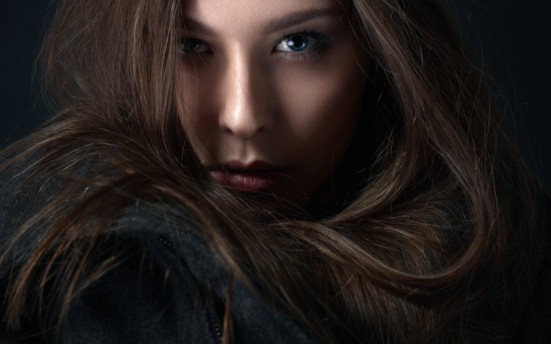 Woman with long brown hair and blue eyes HD Wallpaper