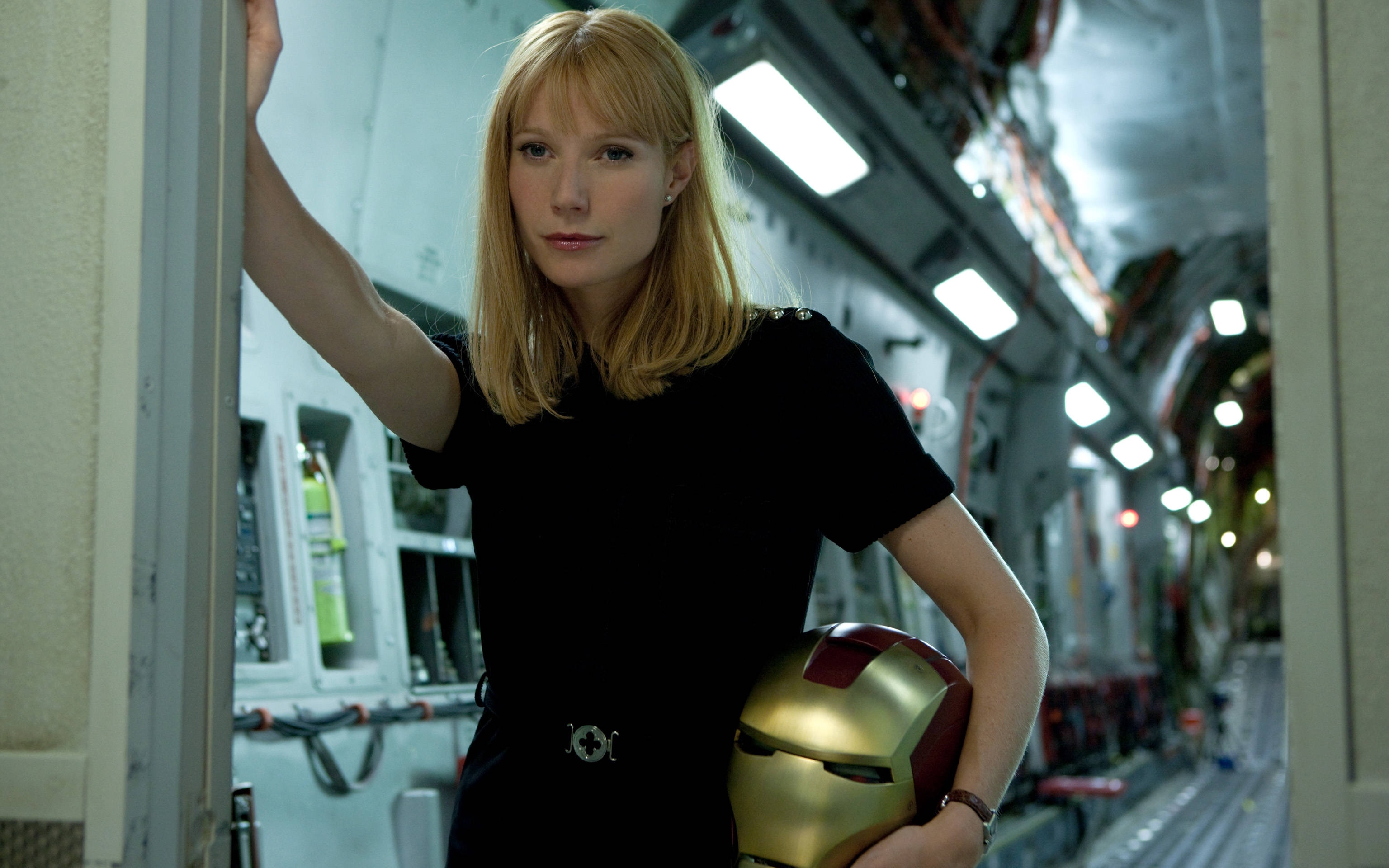 Pepper Potts from Iron Man holding Iron Man's helmet HD Wallpaper