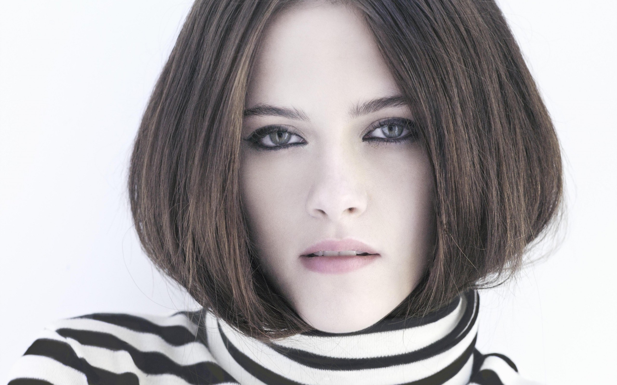 Woman with bob haircut and striped turtleneck HD Wallpaper