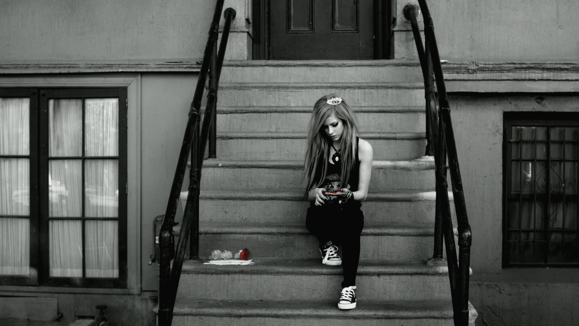 Avril Lavigne sitting on stairs HD Wallpaper