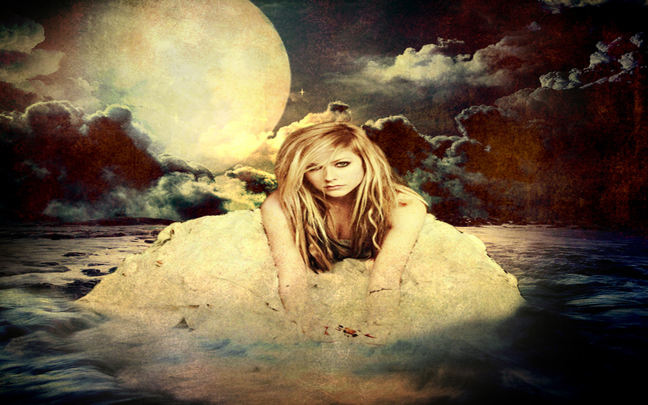 Avril Lavigne on a rock in the ocean HD Wallpaper