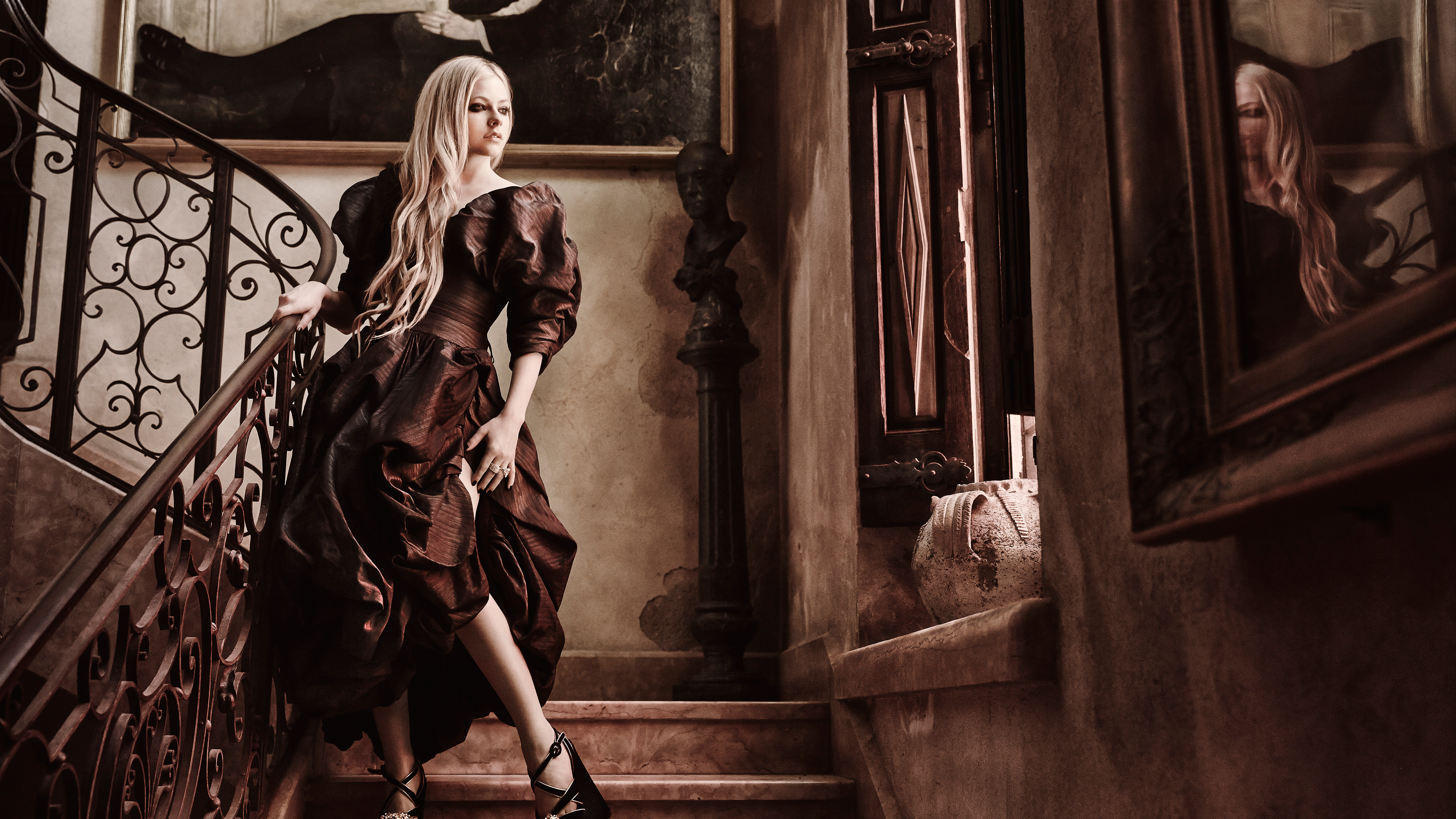 Avril Lavigne on a grand staircase HD Wallpaper