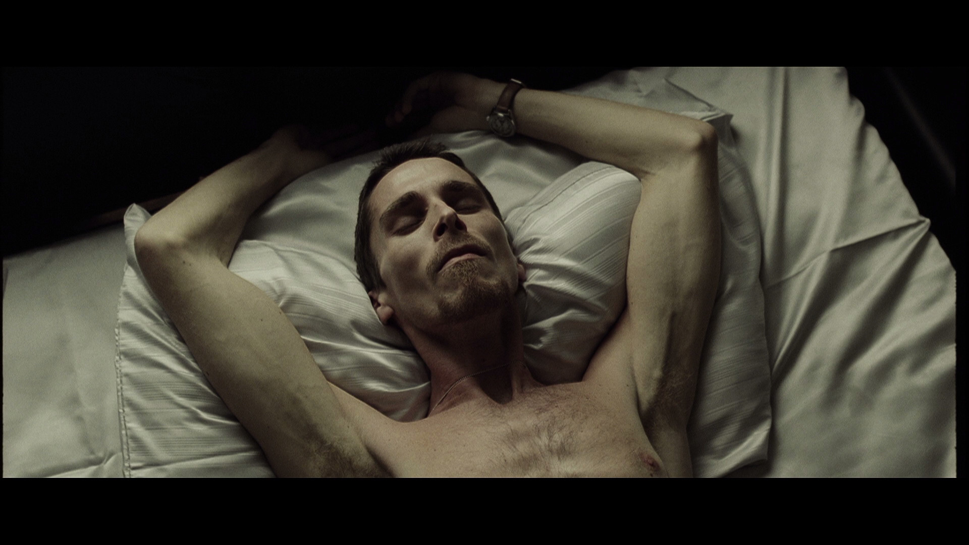 Christian Bale lying in bed HD Wallpaper