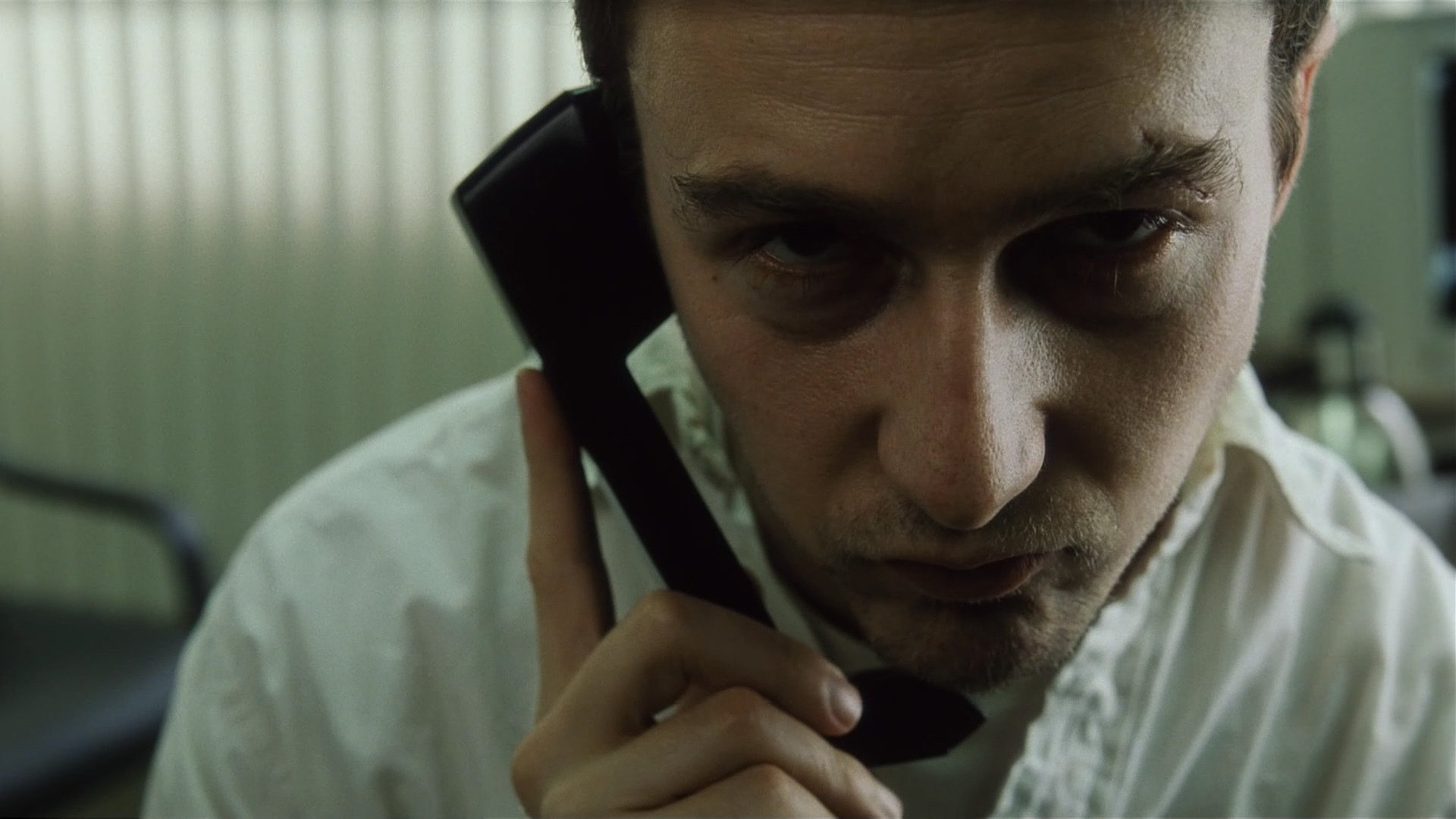 Edward Norton on a phone HD Wallpaper