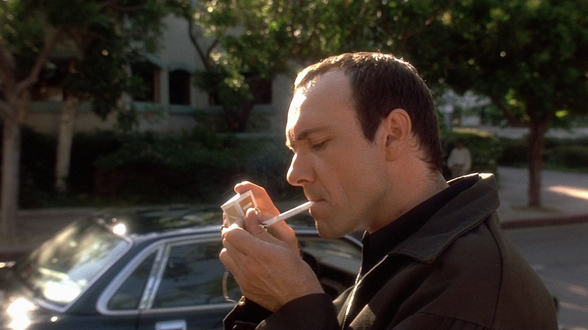 Kevin Spacey lighting a cigarette HD Wallpaper