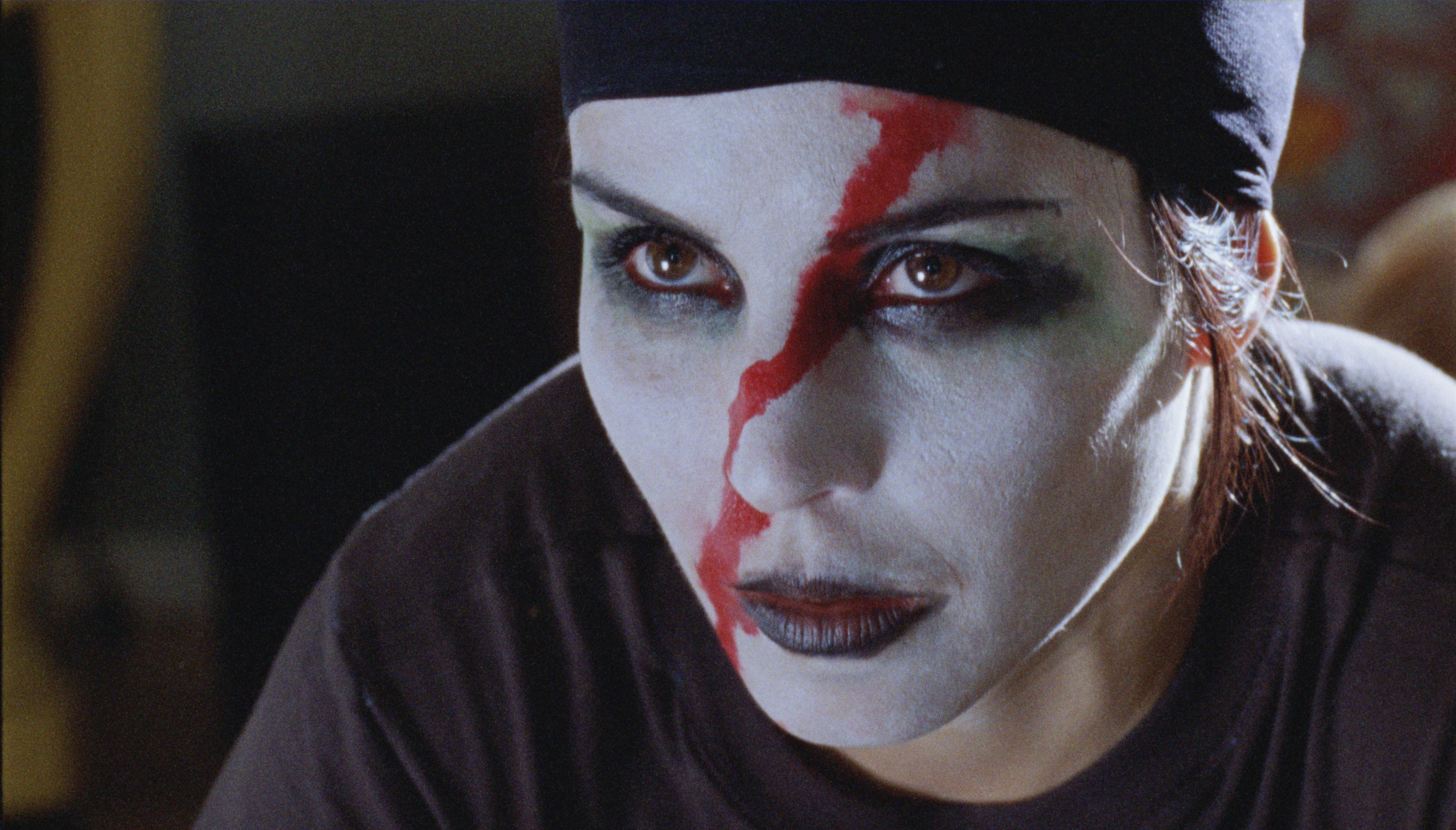 Noomi Rapace with face paint HD Wallpaper
